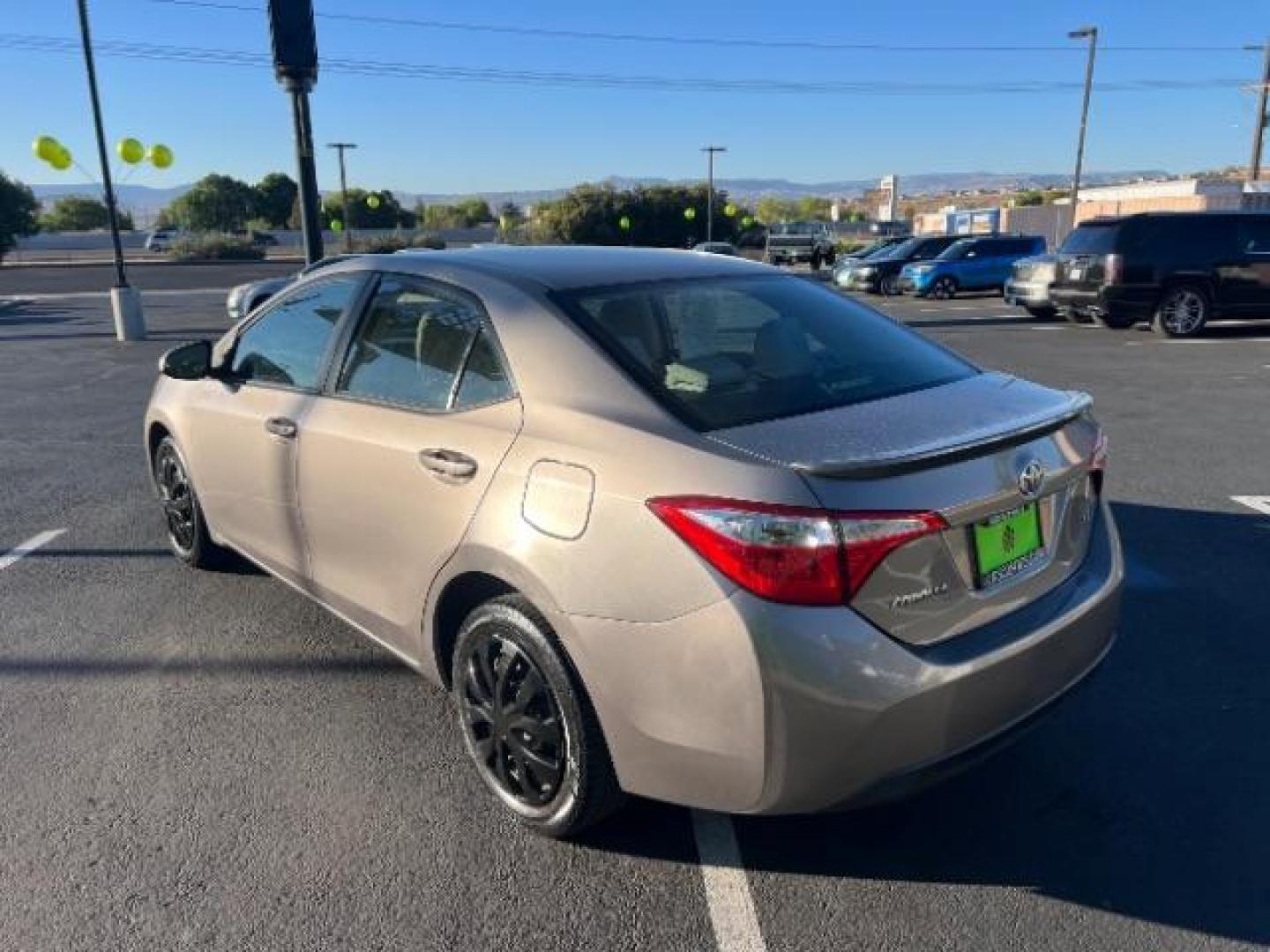 2015 Black Sand Pearl /Steel Grey Fabric, cloth Toyota Corolla L 4-Speed AT (2T1BURHE2FC) with an 1.8L L4 DOHC 16V engine, 4-Speed Automatic transmission, located at 1865 East Red Hills Pkwy, St. George, 84770, (435) 628-0023, 37.120850, -113.543640 - We specialize in helping ALL people get the best financing available. No matter your credit score, good, bad or none we can get you an amazing rate. Had a bankruptcy, divorce, or repossessions? We give you the green light to get your credit back on the road. Low down and affordable payments that fit - Photo#4