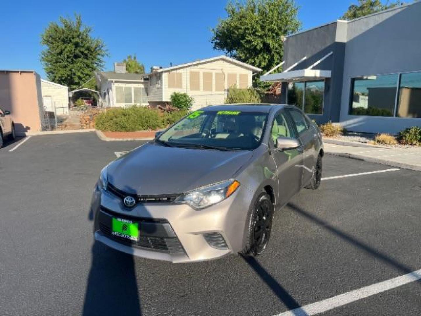 2015 Black Sand Pearl /Steel Grey Fabric, cloth Toyota Corolla L 4-Speed AT (2T1BURHE2FC) with an 1.8L L4 DOHC 16V engine, 4-Speed Automatic transmission, located at 1865 East Red Hills Pkwy, St. George, 84770, (435) 628-0023, 37.120850, -113.543640 - Photo#2