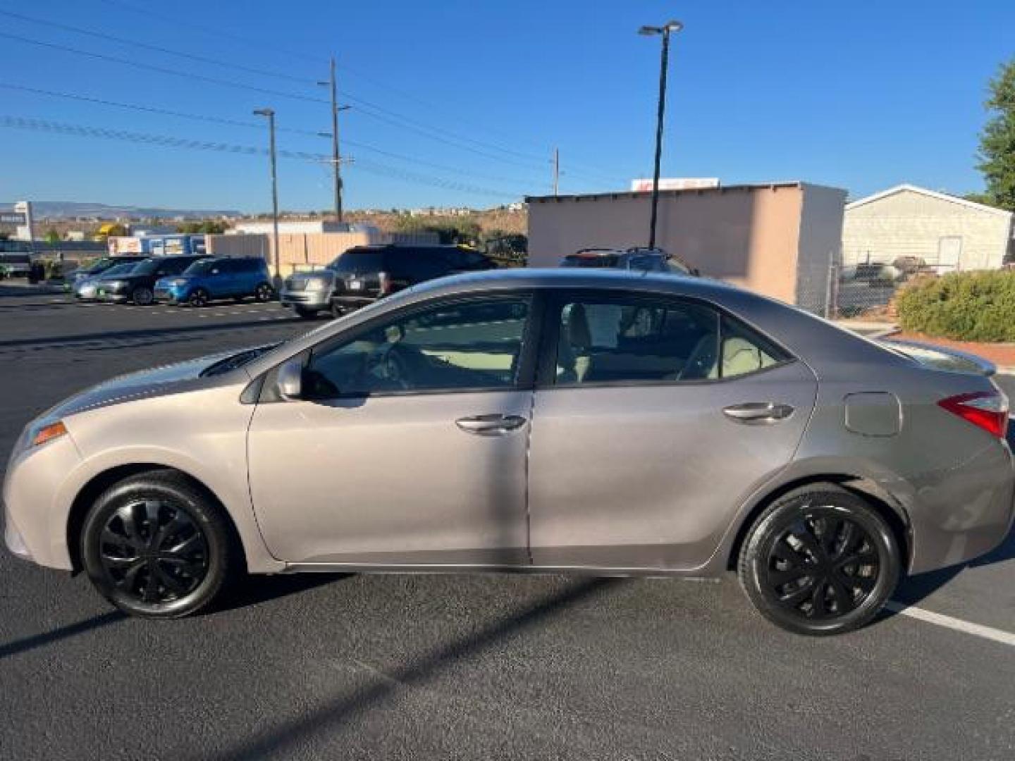 2015 Black Sand Pearl /Steel Grey Fabric, cloth Toyota Corolla L 4-Speed AT (2T1BURHE2FC) with an 1.8L L4 DOHC 16V engine, 4-Speed Automatic transmission, located at 1865 East Red Hills Pkwy, St. George, 84770, (435) 628-0023, 37.120850, -113.543640 - Photo#3