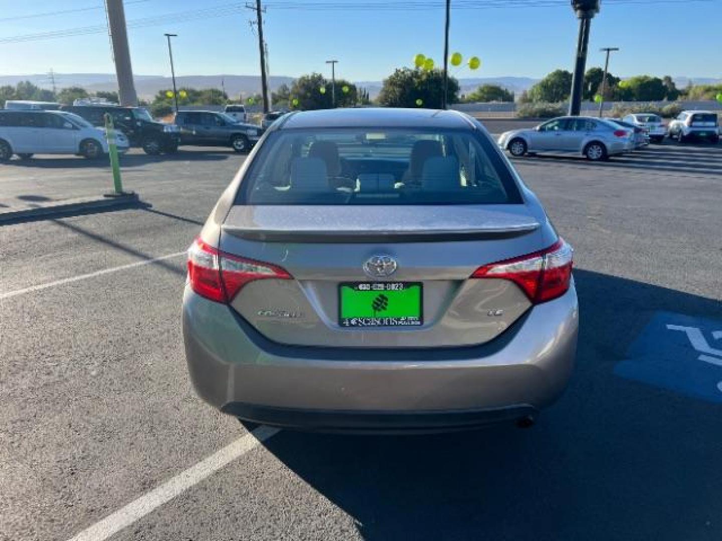 2015 Black Sand Pearl /Steel Grey Fabric, cloth Toyota Corolla L 4-Speed AT (2T1BURHE2FC) with an 1.8L L4 DOHC 16V engine, 4-Speed Automatic transmission, located at 1865 East Red Hills Pkwy, St. George, 84770, (435) 628-0023, 37.120850, -113.543640 - Photo#5