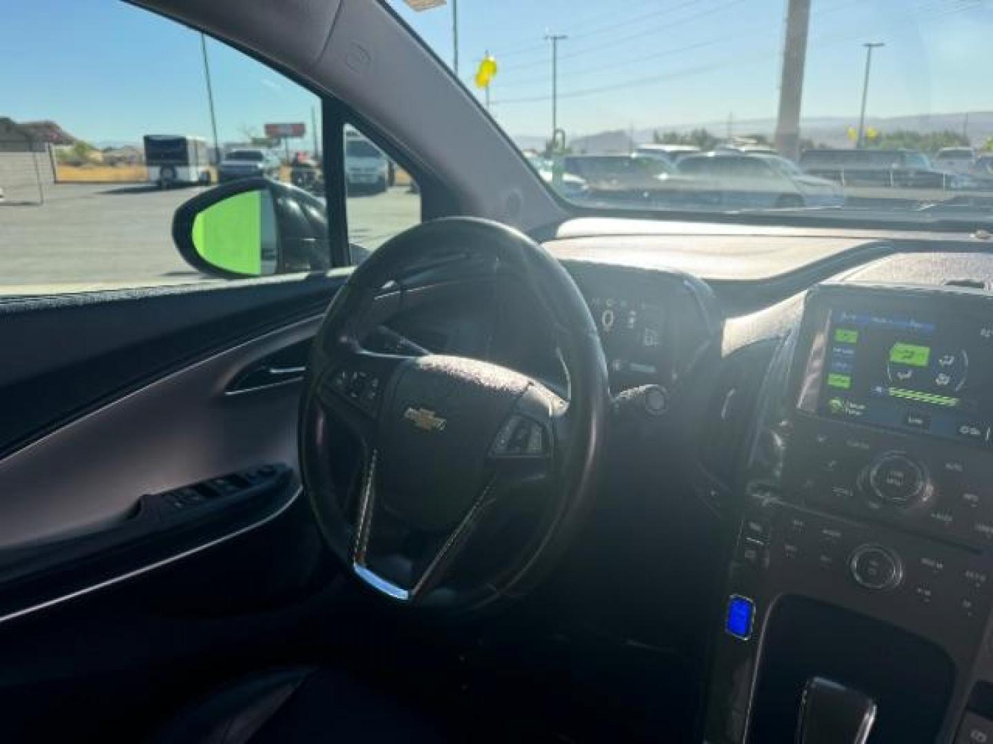 2015 Black /Jet Black/Dark Accents Chevrolet Volt Premium w/ Navigation (1G1RD6E48FU) with an 1.4L L4 DOHC 16V PLUG-IN HYBRID engine, Continuously Variable Transmission transmission, located at 940 North Main Street, Cedar City, UT, 84720, (435) 628-0023, 37.692936, -113.061897 - ***This vehicle qualifies for the EV/Hybrid tax rebate of up to $4,000*** We are setup with the IRS to recieve direct payments within 72 hours. We file the rebate online with IRS and can credit it to your down payment, reduce the sales price OR give you cashback!! These cars will not last and can o - Photo#31