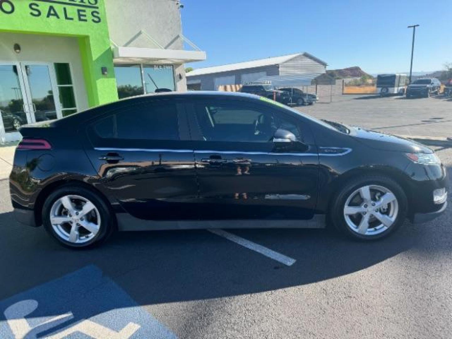 2015 Black /Jet Black/Dark Accents Chevrolet Volt Premium w/ Navigation (1G1RD6E48FU) with an 1.4L L4 DOHC 16V PLUG-IN HYBRID engine, Continuously Variable Transmission transmission, located at 940 North Main Street, Cedar City, UT, 84720, (435) 628-0023, 37.692936, -113.061897 - ***This vehicle qualifies for the EV/Hybrid tax rebate of up to $4,000*** We are setup with the IRS to recieve direct payments within 72 hours. We file the rebate online with IRS and can credit it to your down payment, reduce the sales price OR give you cashback!! These cars will not last and can o - Photo#7