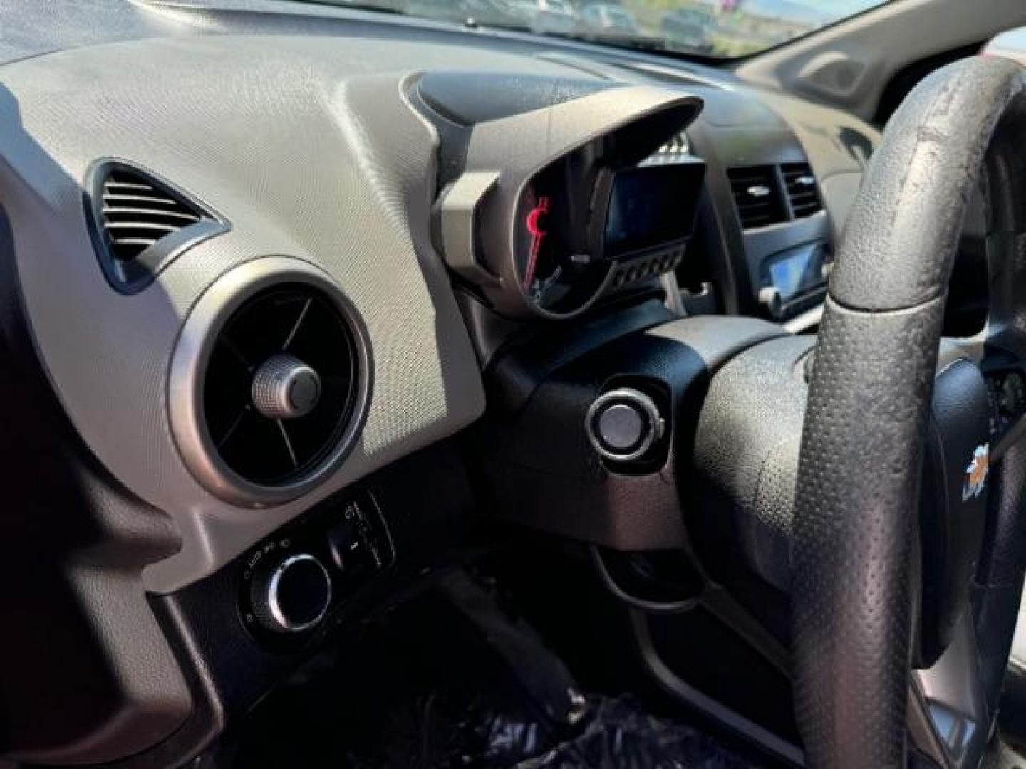 2014 Crystal Red Tintcoat /Jet Black/Dark Titanium Chevrolet Sonic LT Auto Sedan (1G1JC5SH5E4) with an 1.8L L4 DOHC 24V engine, 6-Speed Automatic transmission, located at 940 North Main Street, Cedar City, UT, 84720, (435) 628-0023, 37.692936, -113.061897 - We specialize in helping ALL people get the best financing available. No matter your credit score, good, bad or none we can get you an amazing rate. Had a bankruptcy, divorce, or repossessions? We give you the green light to get your credit back on the road. Low down and affordable payments that fit - Photo#15