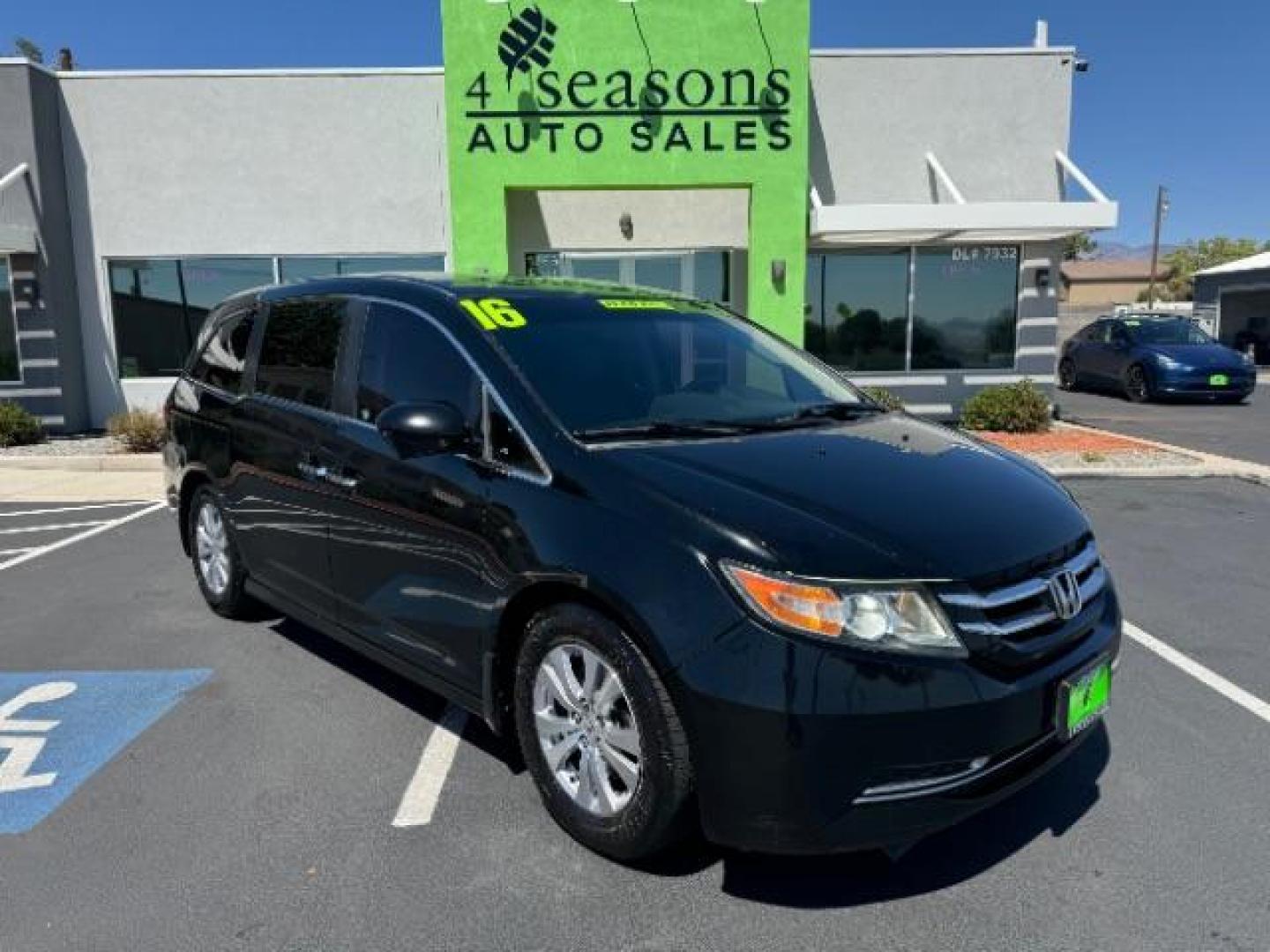 2016 Crystal Black Pearl /Truffle, cloth Honda Odyssey SE (5FNRL5H36GB) with an 3.5L V6 SOHC 24V engine, 6-Speed Automatic transmission, located at 1865 East Red Hills Pkwy, St. George, 84770, (435) 628-0023, 37.120850, -113.543640 - Photo#0