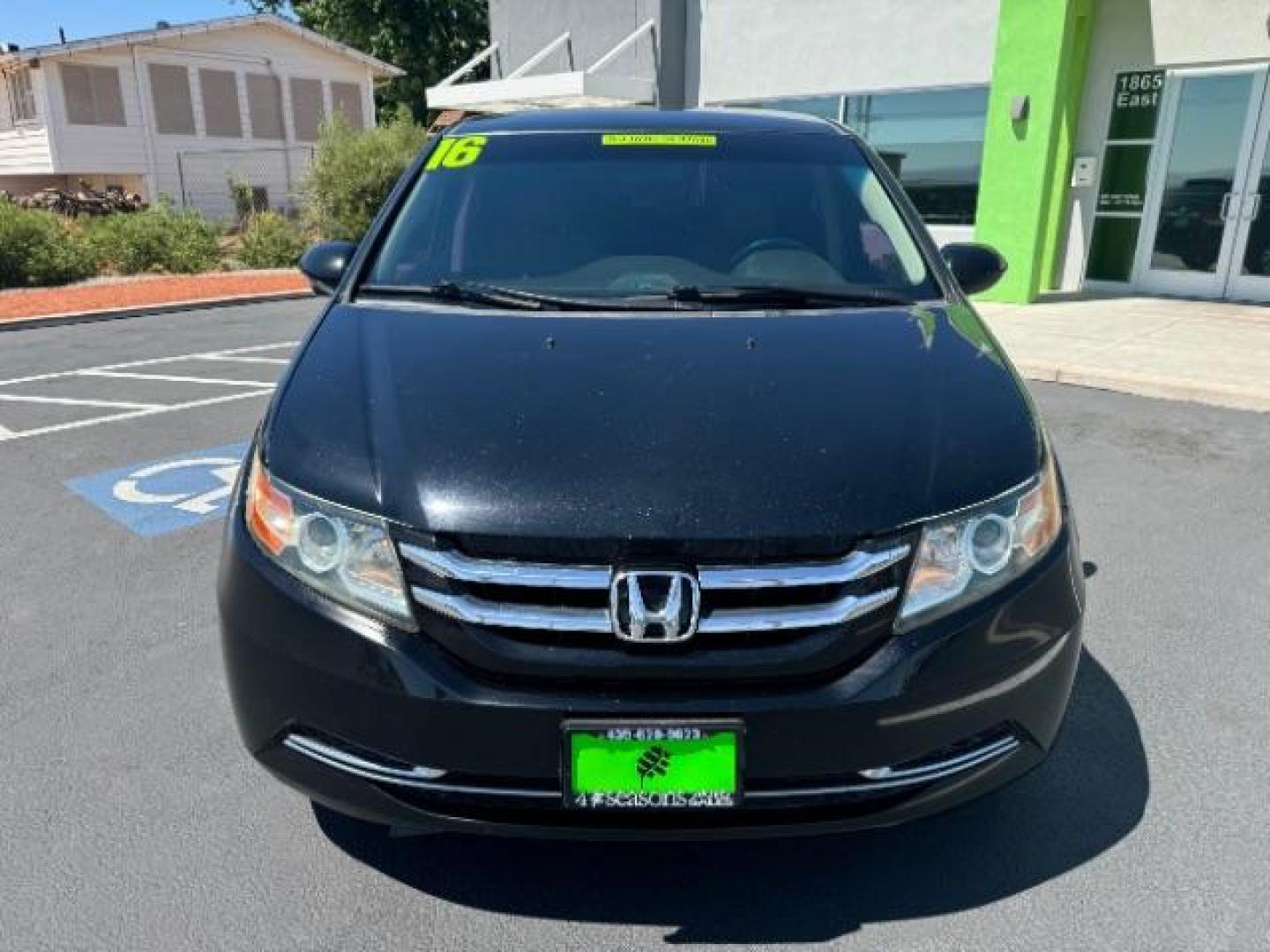 2016 Crystal Black Pearl /Truffle, cloth Honda Odyssey SE (5FNRL5H36GB) with an 3.5L V6 SOHC 24V engine, 6-Speed Automatic transmission, located at 1865 East Red Hills Pkwy, St. George, 84770, (435) 628-0023, 37.120850, -113.543640 - Photo#1