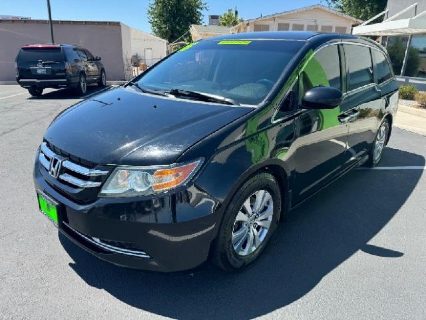 2016 Crystal Black Pearl /Truffle, cloth Honda Odyssey SE (5FNRL5H36GB) with an 3.5L V6 SOHC 24V engine, 6-Speed Automatic transmission, located at 1865 East Red Hills Pkwy, St. George, 84770, (435) 628-0023, 37.120850, -113.543640 - Photo#2