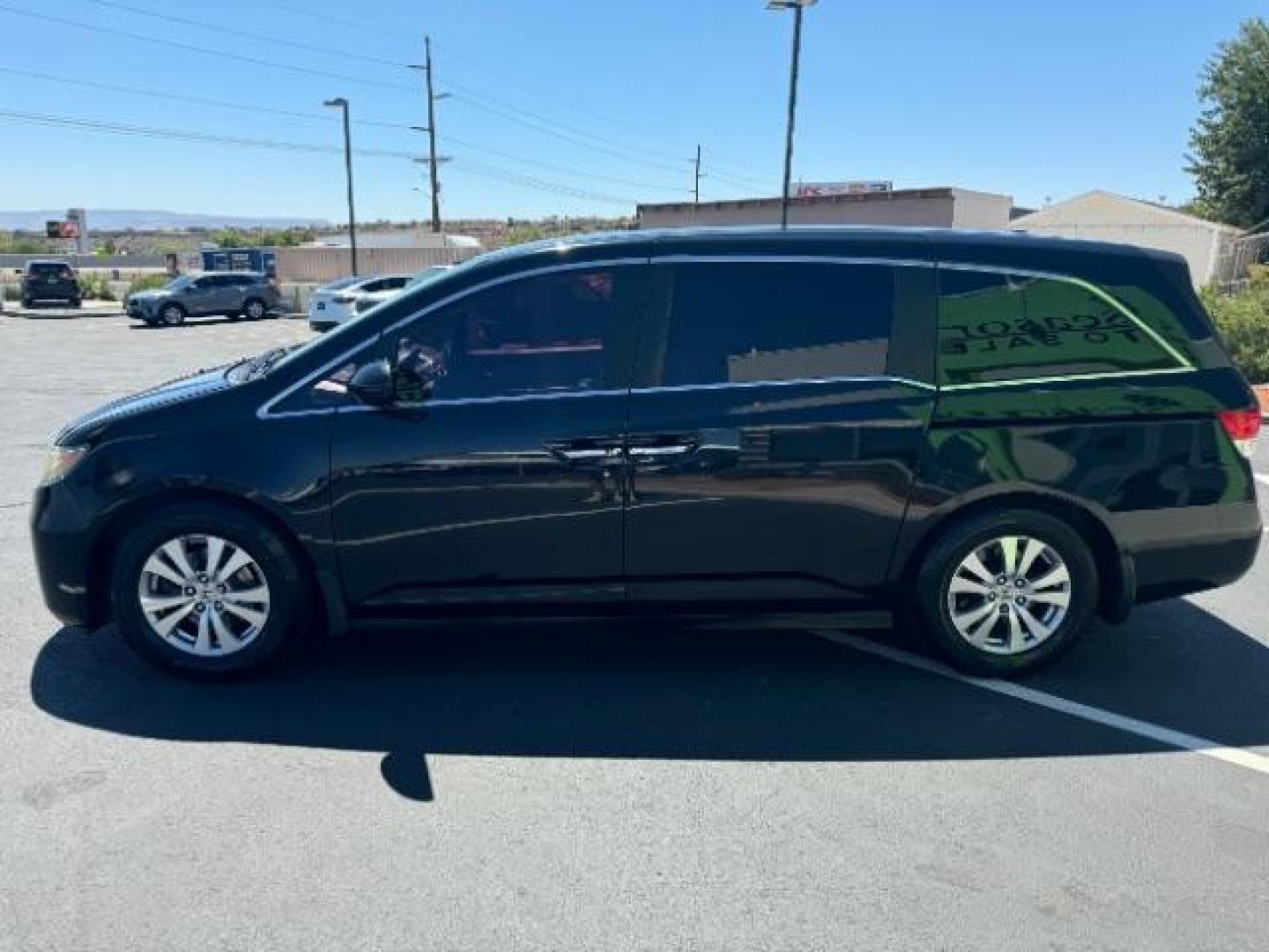 2016 Crystal Black Pearl /Truffle, cloth Honda Odyssey SE (5FNRL5H36GB) with an 3.5L V6 SOHC 24V engine, 6-Speed Automatic transmission, located at 1865 East Red Hills Pkwy, St. George, 84770, (435) 628-0023, 37.120850, -113.543640 - Photo#3