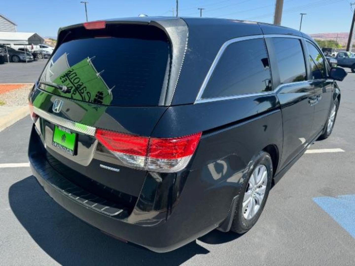 2016 Crystal Black Pearl /Truffle, cloth Honda Odyssey SE (5FNRL5H36GB) with an 3.5L V6 SOHC 24V engine, 6-Speed Automatic transmission, located at 1865 East Red Hills Pkwy, St. George, 84770, (435) 628-0023, 37.120850, -113.543640 - Photo#6