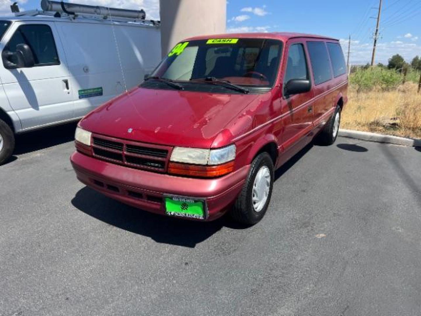 1994 Red /Black Interior Dodge Grand Caravan SE (1B4GH44R7RX) with an 3.3L V6 OHV 12V engine, 4-Speed Automatic transmission, located at 1865 East Red Hills Pkwy, St. George, 84770, (435) 628-0023, 37.120850, -113.543640 - This vehicle is a Mechanic Special. This means it will need some love. Runs a drives fine but has body damage, leaks or other mechanical issues. It did NOT pass our 50 point inspection. Get a great deal on a less than perfect car. These cars do NOT qualify for our in house financing. Cash and carry, - Photo#2