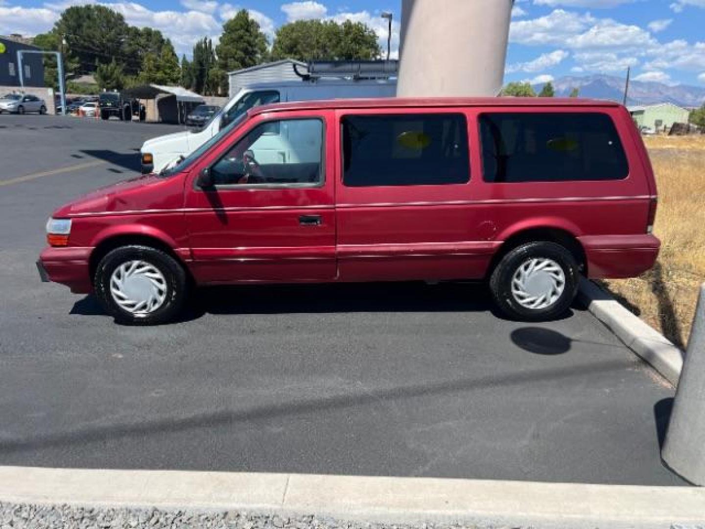 1994 Red /Black Interior Dodge Grand Caravan SE (1B4GH44R7RX) with an 3.3L V6 OHV 12V engine, 4-Speed Automatic transmission, located at 1865 East Red Hills Pkwy, St. George, 84770, (435) 628-0023, 37.120850, -113.543640 - This vehicle is a Mechanic Special. This means it will need some love. Runs a drives fine but has body damage, leaks or other mechanical issues. It did NOT pass our 50 point inspection. Get a great deal on a less than perfect car. These cars do NOT qualify for our in house financing. Cash and carry, - Photo#3