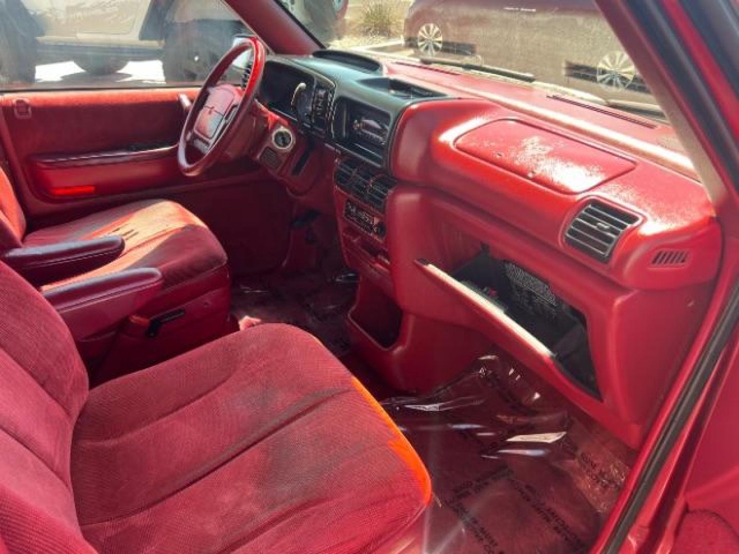 1994 Red /Black Interior Dodge Grand Caravan SE (1B4GH44R7RX) with an 3.3L V6 OHV 12V engine, 4-Speed Automatic transmission, located at 1865 East Red Hills Pkwy, St. George, 84770, (435) 628-0023, 37.120850, -113.543640 - This vehicle is a Mechanic Special. This means it will need some love. Runs a drives fine but has body damage, leaks or other mechanical issues. It did NOT pass our 50 point inspection. Get a great deal on a less than perfect car. These cars do NOT qualify for our in house financing. Cash and carry, - Photo#8