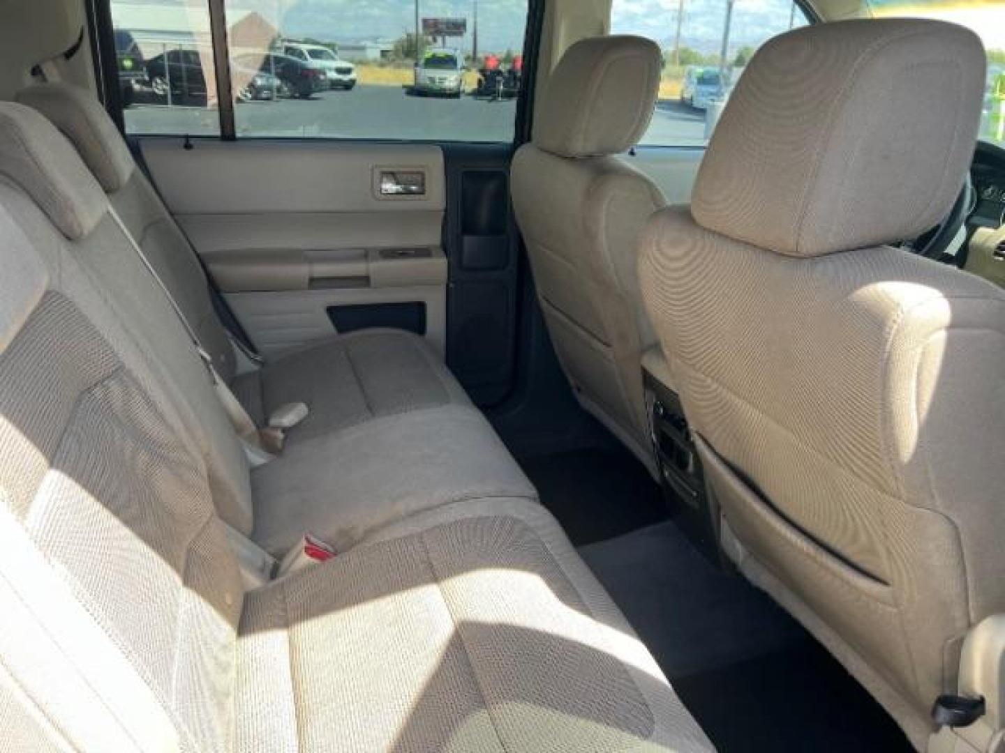 2009 Sterling Grey Metallic /Medium Light Stone Cloth Interior Ford Flex SE FWD (2FMDK51C49B) with an 3.5L V6 DOHC 24V engine, 6-Speed Automatic transmission, located at 1865 East Red Hills Pkwy, St. George, 84770, (435) 628-0023, 37.120850, -113.543640 - We specialize in helping ALL people get the best financing available. No matter your credit score, good, bad or none we can get you an amazing rate. Had a bankruptcy, divorce, or repossessions? We give you the green light to get your credit back on the road. Low down and affordable payments that fit - Photo#32