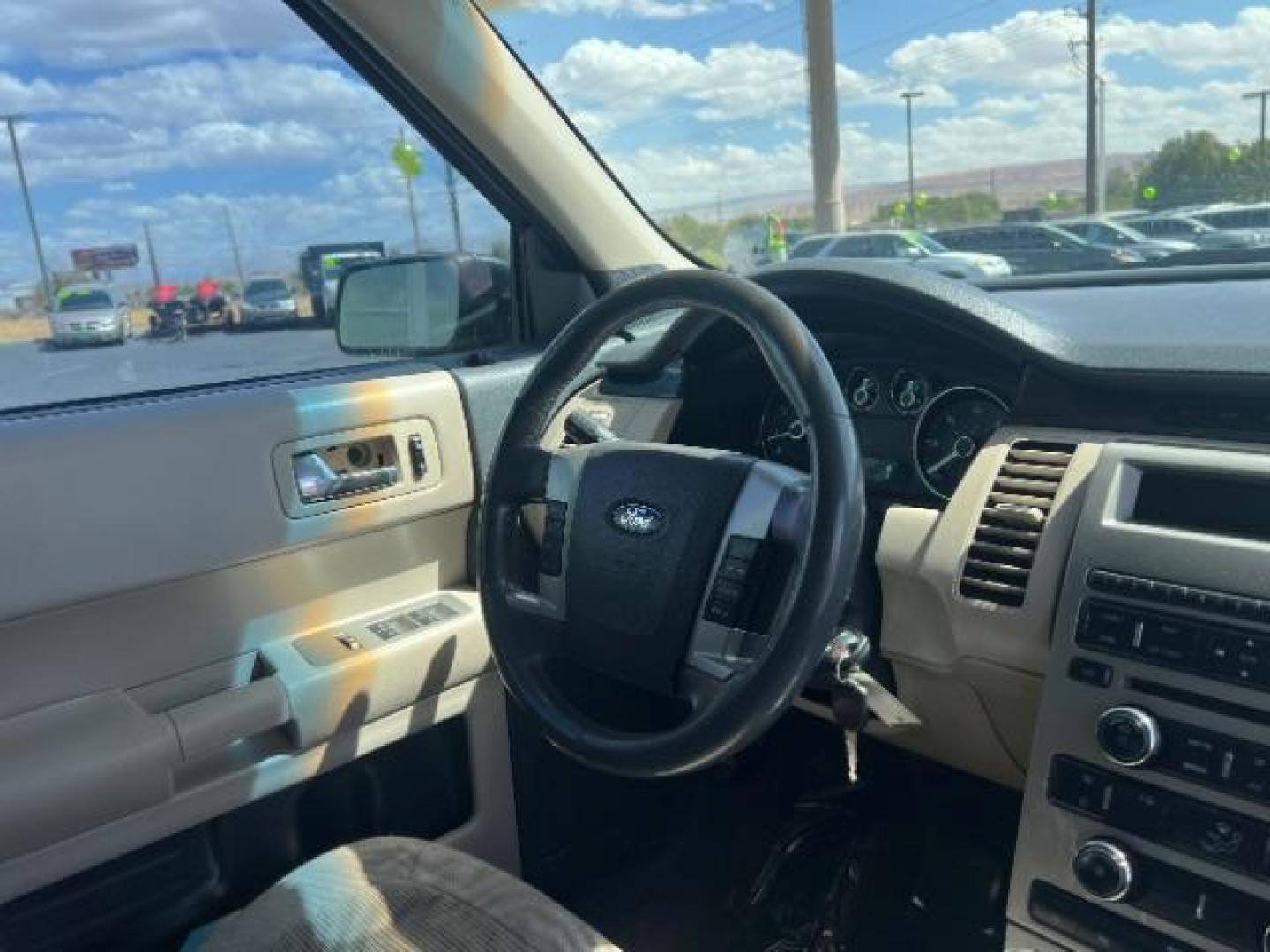 2009 Sterling Grey Metallic /Medium Light Stone Cloth Interior Ford Flex SE FWD (2FMDK51C49B) with an 3.5L V6 DOHC 24V engine, 6-Speed Automatic transmission, located at 1865 East Red Hills Pkwy, St. George, 84770, (435) 628-0023, 37.120850, -113.543640 - We specialize in helping ALL people get the best financing available. No matter your credit score, good, bad or none we can get you an amazing rate. Had a bankruptcy, divorce, or repossessions? We give you the green light to get your credit back on the road. Low down and affordable payments that fit - Photo#35