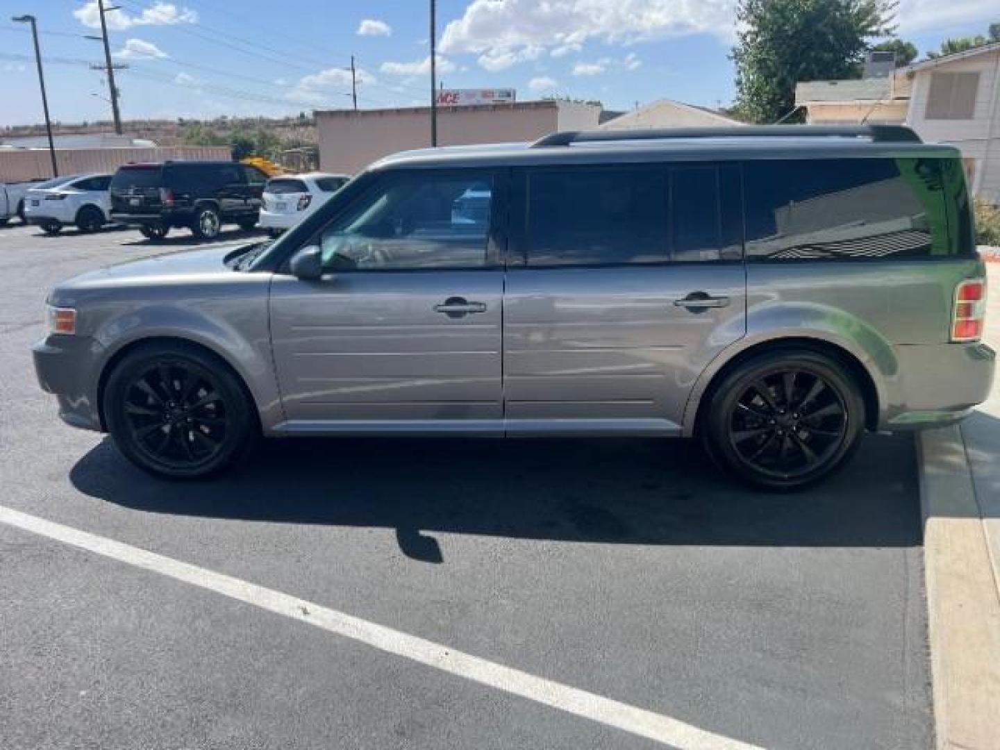 2009 Sterling Grey Metallic /Medium Light Stone Cloth Interior Ford Flex SE FWD (2FMDK51C49B) with an 3.5L V6 DOHC 24V engine, 6-Speed Automatic transmission, located at 1865 East Red Hills Pkwy, St. George, 84770, (435) 628-0023, 37.120850, -113.543640 - We specialize in helping ALL people get the best financing available. No matter your credit score, good, bad or none we can get you an amazing rate. Had a bankruptcy, divorce, or repossessions? We give you the green light to get your credit back on the road. Low down and affordable payments that fit - Photo#3