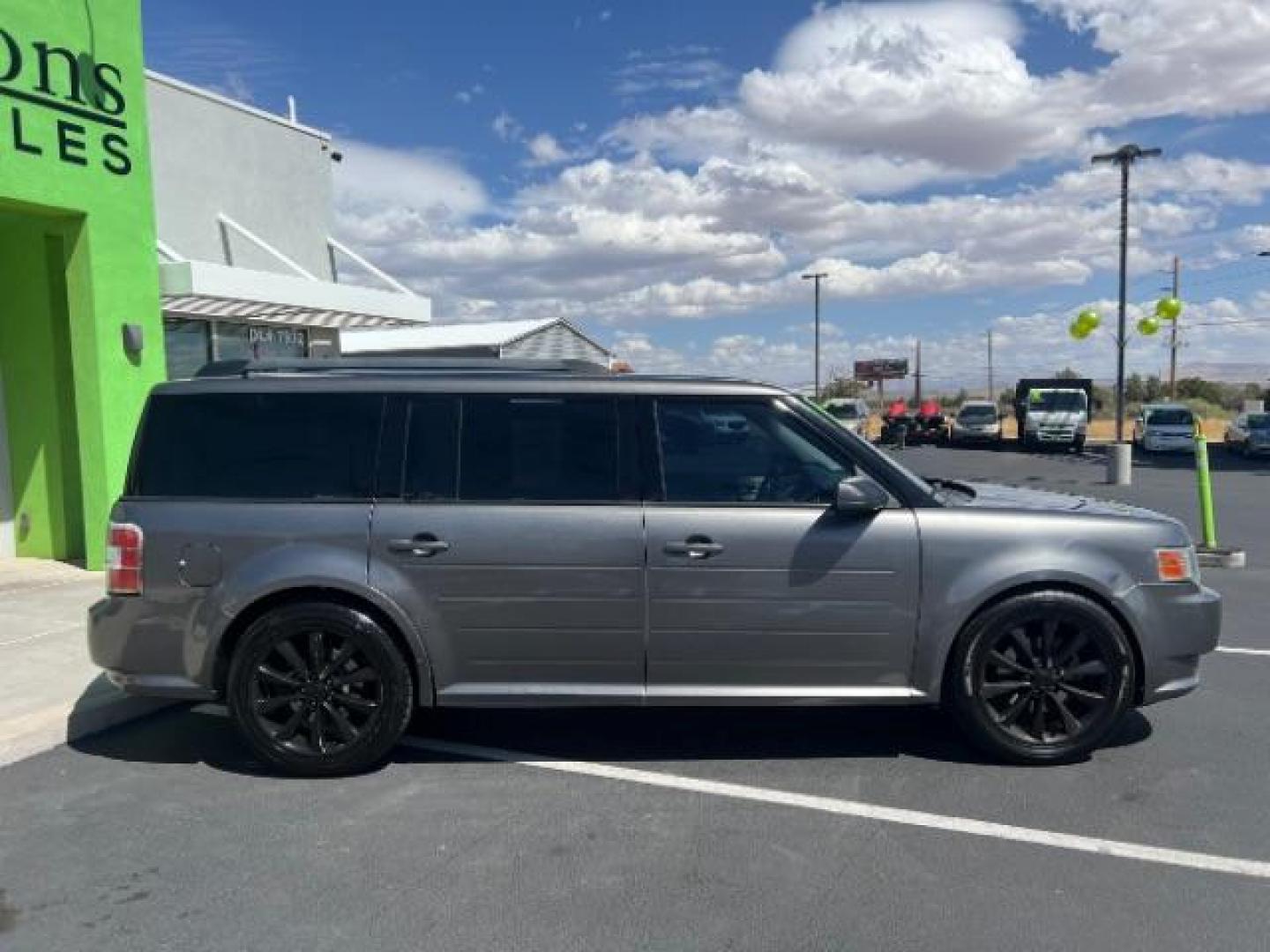 2009 Sterling Grey Metallic /Medium Light Stone Cloth Interior Ford Flex SE FWD (2FMDK51C49B) with an 3.5L V6 DOHC 24V engine, 6-Speed Automatic transmission, located at 1865 East Red Hills Pkwy, St. George, 84770, (435) 628-0023, 37.120850, -113.543640 - We specialize in helping ALL people get the best financing available. No matter your credit score, good, bad or none we can get you an amazing rate. Had a bankruptcy, divorce, or repossessions? We give you the green light to get your credit back on the road. Low down and affordable payments that fit - Photo#7