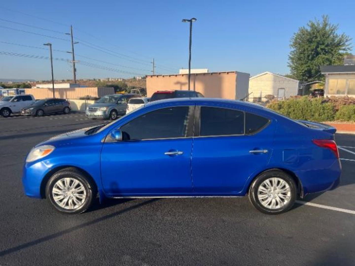 2014 Blue Onyx /Charcoal Nissan Versa 1.6 SV Sedan (3N1CN7AP9EL) with an 1.6L L4 DOHC 16V engine, automatic transmission, located at 1865 East Red Hills Pkwy, St. George, 84770, (435) 628-0023, 37.120850, -113.543640 - Photo#3