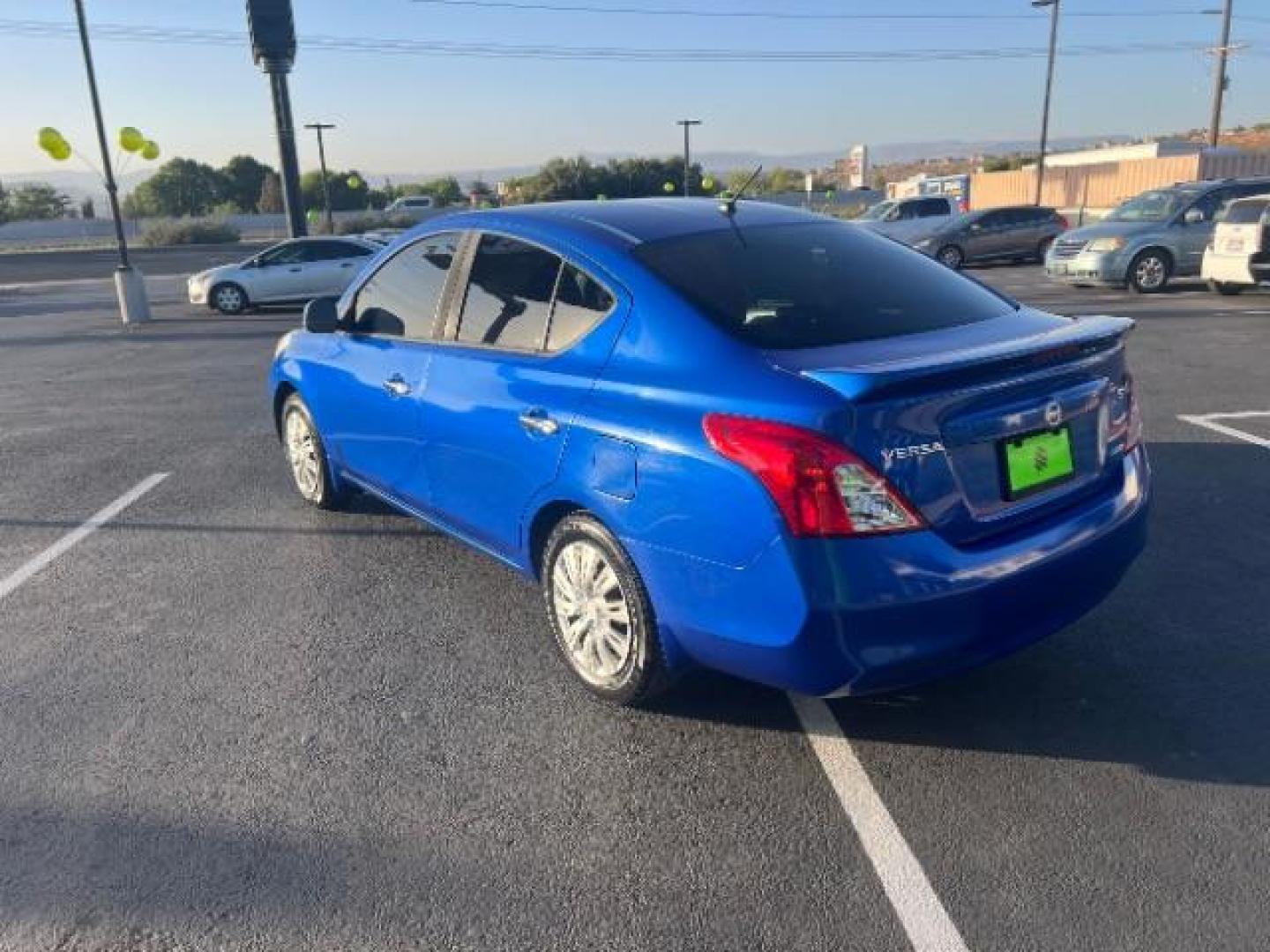 2014 Blue Onyx /Charcoal Nissan Versa 1.6 SV Sedan (3N1CN7AP9EL) with an 1.6L L4 DOHC 16V engine, automatic transmission, located at 1865 East Red Hills Pkwy, St. George, 84770, (435) 628-0023, 37.120850, -113.543640 - Photo#4