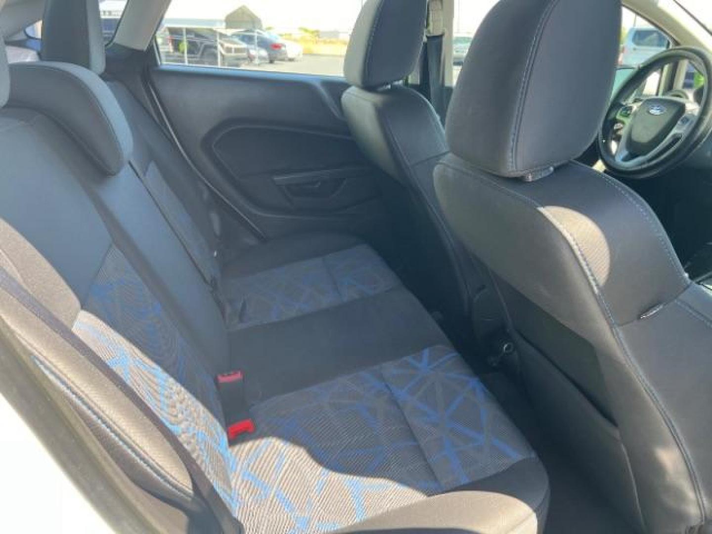 2012 Oxford White /Charcoal Black/Blue Cloth Interior Ford Fiesta SE Sedan (3FADP4BJ1CM) with an 1.6L L4 DOHC 16V engine, 6-Speed Automatic transmission, located at 940 North Main Street, Cedar City, UT, 84720, (435) 628-0023, 37.692936, -113.061897 - We specialize in helping ALL people get the best financing available. No matter your credit score, good, bad or none we can get you an amazing rate. Had a bankruptcy, divorce, or repossessions? We give you the green light to get your credit back on the road. Low down and affordable payments that fit - Photo#27