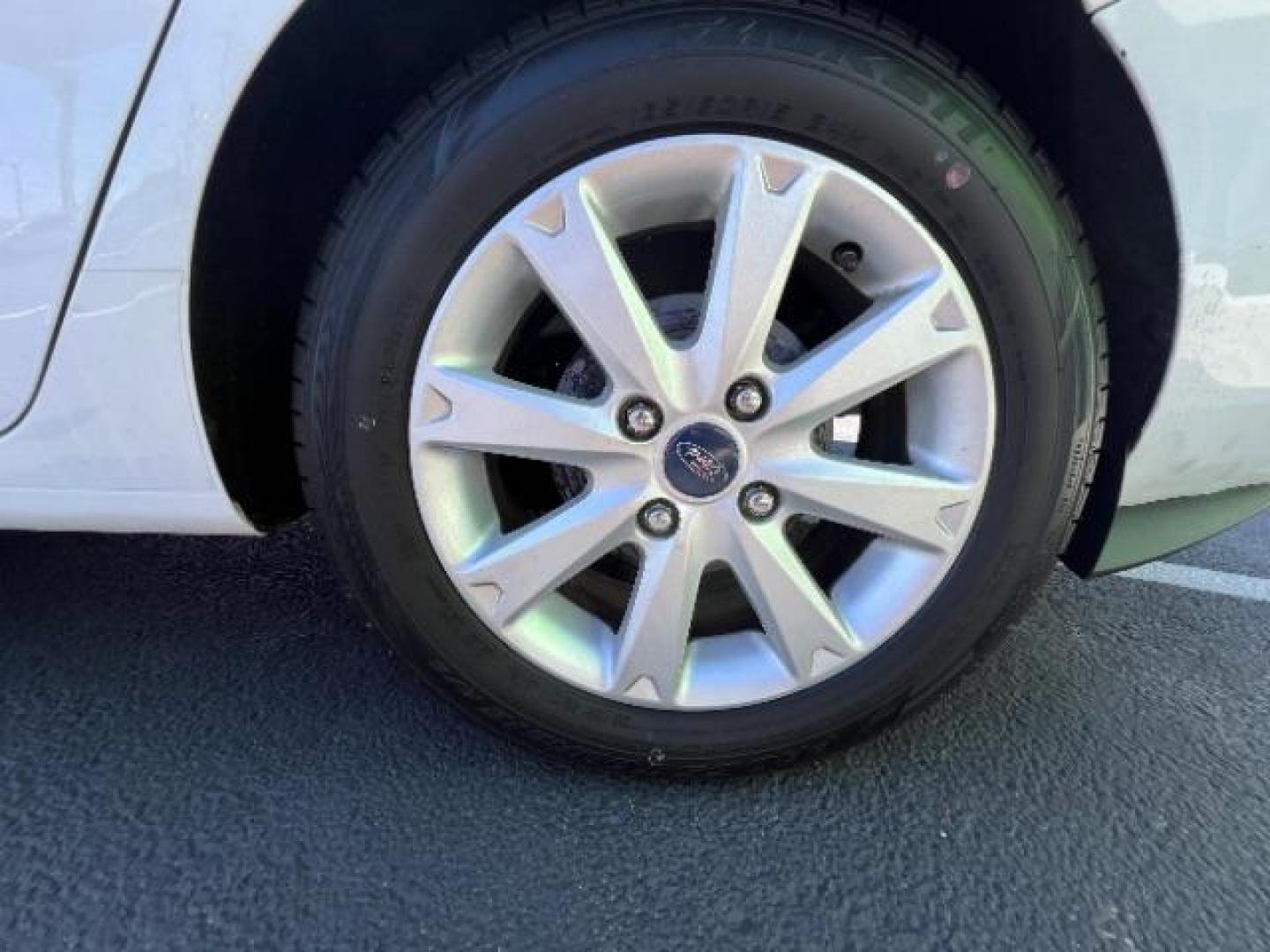 2012 Oxford White /Charcoal Black/Blue Cloth Interior Ford Fiesta SE Sedan (3FADP4BJ1CM) with an 1.6L L4 DOHC 16V engine, 6-Speed Automatic transmission, located at 940 North Main Street, Cedar City, UT, 84720, (435) 628-0023, 37.692936, -113.061897 - We specialize in helping ALL people get the best financing available. No matter your credit score, good, bad or none we can get you an amazing rate. Had a bankruptcy, divorce, or repossessions? We give you the green light to get your credit back on the road. Low down and affordable payments that fit - Photo#8