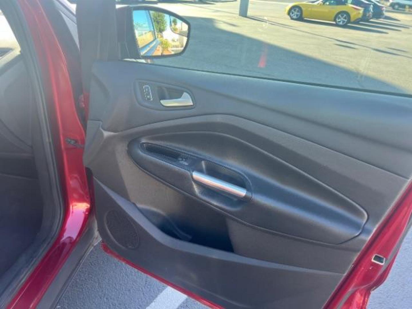 2015 Ruby Red Met Tinted CC /Charcoal Black Ford Escape SE FWD (1FMCU0G79FU) with an 2.5L L4 DOHC 16V engine, 6-Speed Automatic transmission, located at 940 North Main Street, Cedar City, UT, 84720, (435) 628-0023, 37.692936, -113.061897 - Photo#27