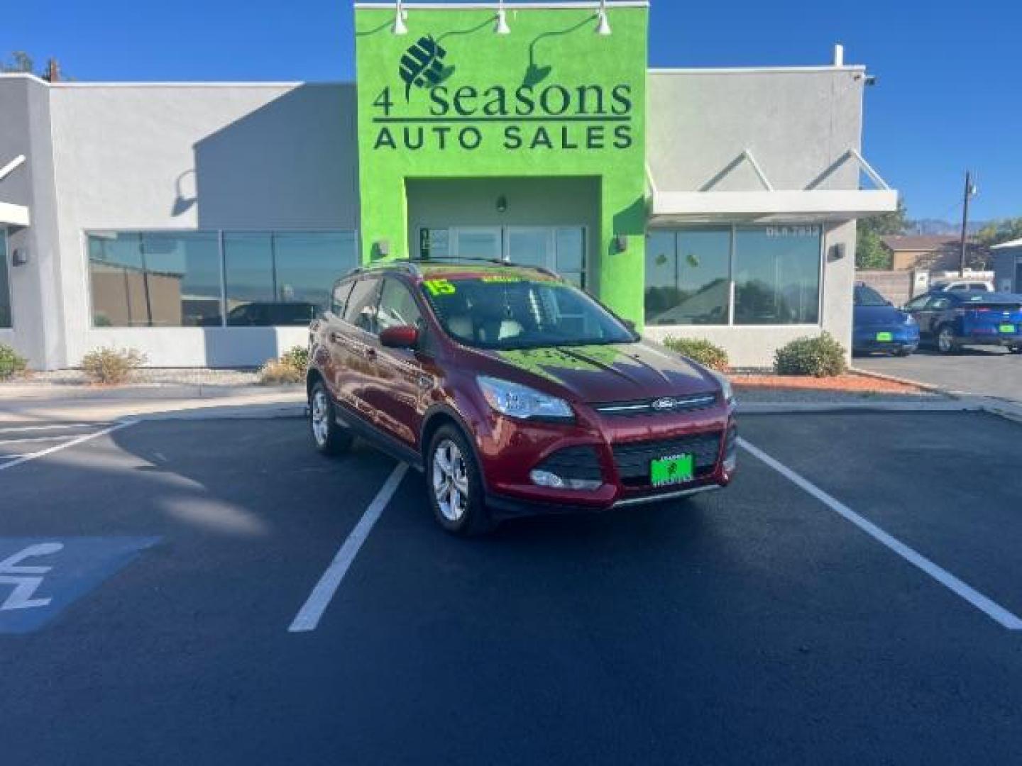 2015 Ruby Red Met Tinted CC /Charcoal Black Ford Escape SE FWD (1FMCU0G79FU) with an 2.5L L4 DOHC 16V engine, 6-Speed Automatic transmission, located at 1865 East Red Hills Pkwy, St. George, 84770, (435) 628-0023, 37.120850, -113.543640 - Photo#0