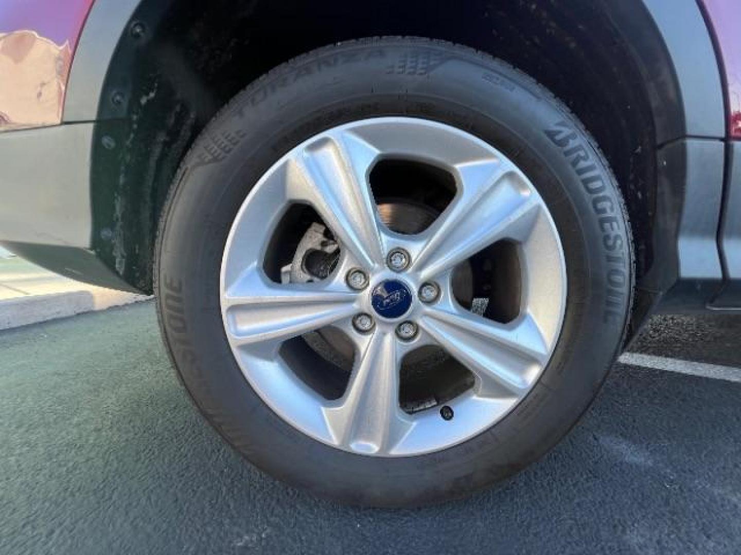 2015 Ruby Red Met Tinted CC /Charcoal Black Ford Escape SE FWD (1FMCU0G79FU) with an 2.5L L4 DOHC 16V engine, 6-Speed Automatic transmission, located at 1865 East Red Hills Pkwy, St. George, 84770, (435) 628-0023, 37.120850, -113.543640 - Photo#11