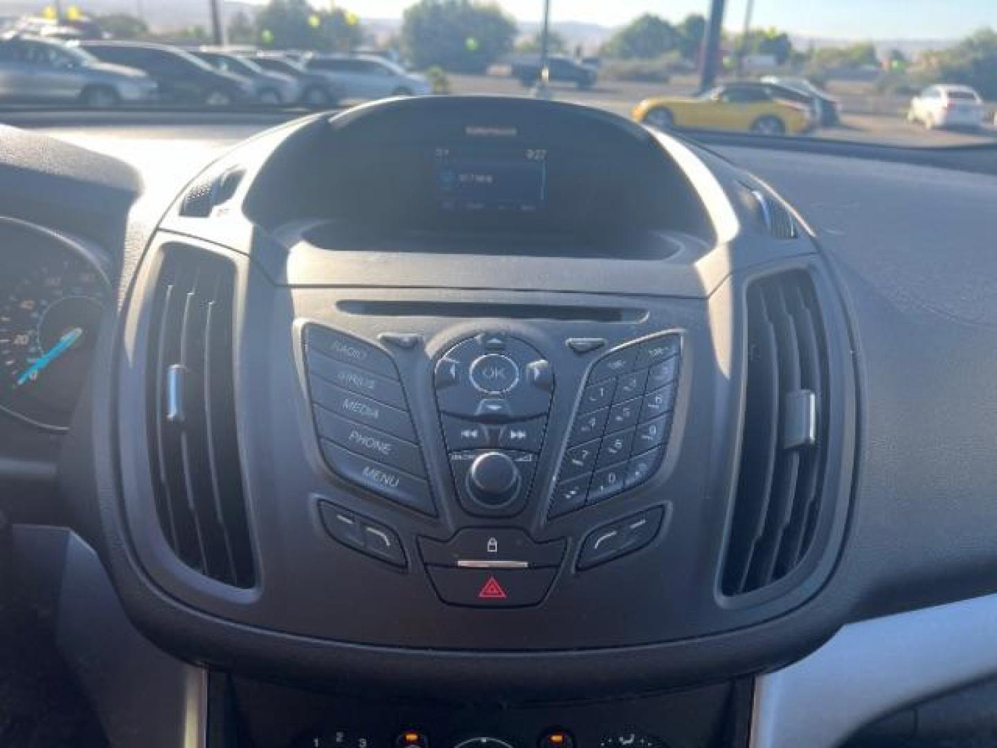 2015 Ruby Red Met Tinted CC /Charcoal Black Ford Escape SE FWD (1FMCU0G79FU) with an 2.5L L4 DOHC 16V engine, 6-Speed Automatic transmission, located at 1865 East Red Hills Pkwy, St. George, 84770, (435) 628-0023, 37.120850, -113.543640 - Photo#20