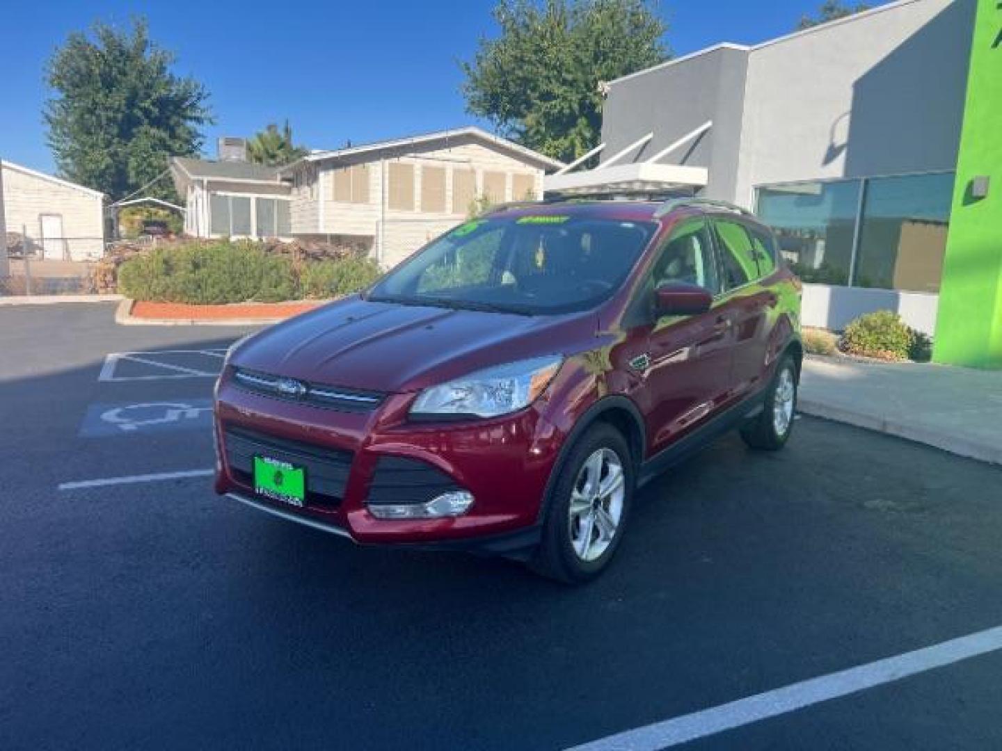 2015 Ruby Red Met Tinted CC /Charcoal Black Ford Escape SE FWD (1FMCU0G79FU) with an 2.5L L4 DOHC 16V engine, 6-Speed Automatic transmission, located at 1865 East Red Hills Pkwy, St. George, 84770, (435) 628-0023, 37.120850, -113.543640 - Photo#2