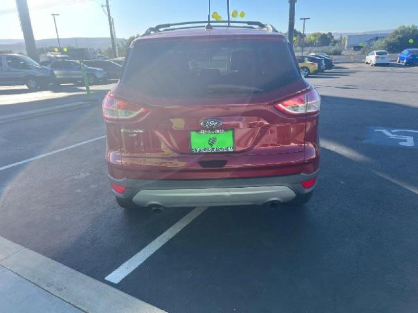 2015 Ruby Red Met Tinted CC /Charcoal Black Ford Escape SE FWD (1FMCU0G79FU) with an 2.5L L4 DOHC 16V engine, 6-Speed Automatic transmission, located at 1865 East Red Hills Pkwy, St. George, 84770, (435) 628-0023, 37.120850, -113.543640 - Photo#5