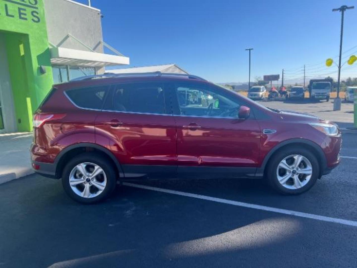 2015 Ruby Red Met Tinted CC /Charcoal Black Ford Escape SE FWD (1FMCU0G79FU) with an 2.5L L4 DOHC 16V engine, 6-Speed Automatic transmission, located at 1865 East Red Hills Pkwy, St. George, 84770, (435) 628-0023, 37.120850, -113.543640 - Photo#7