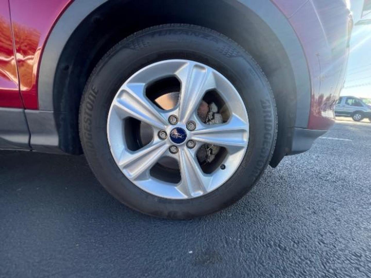 2015 Ruby Red Met Tinted CC /Charcoal Black Ford Escape SE FWD (1FMCU0G79FU) with an 2.5L L4 DOHC 16V engine, 6-Speed Automatic transmission, located at 1865 East Red Hills Pkwy, St. George, 84770, (435) 628-0023, 37.120850, -113.543640 - Photo#8