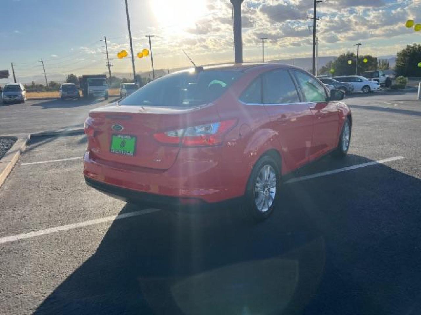 2012 Race Red /Charcoal Black Cloth/Leather Interior Ford Focus SEL Sedan (1FAHP3H29CL) with an 2.0L L4 DOHC 16V engine, 6-Speed Automatic transmission, located at 1865 East Red Hills Pkwy, St. George, 84770, (435) 628-0023, 37.120850, -113.543640 - Photo#6