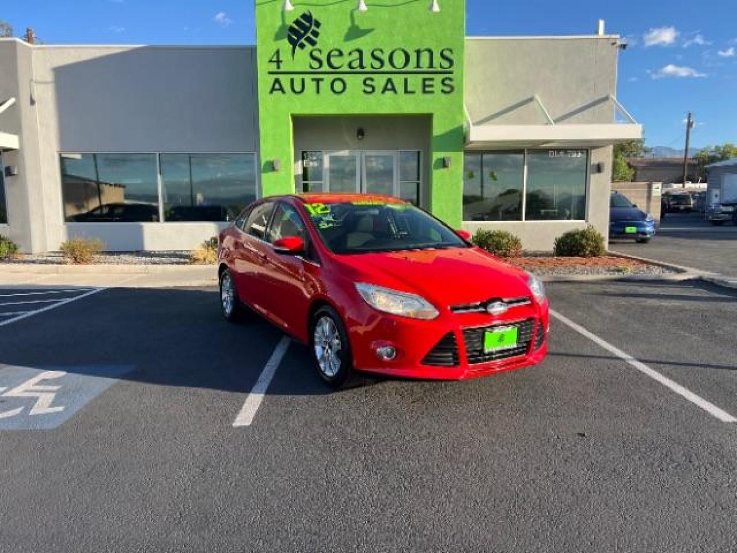 2012 Race Red /Charcoal Black Cloth/Leather Interior Ford Focus SEL Sedan (1FAHP3H29CL) with an 2.0L L4 DOHC 16V engine, 6-Speed Automatic transmission, located at 1865 East Red Hills Pkwy, St. George, 84770, (435) 628-0023, 37.120850, -113.543640 - We specialize in helping ALL people get the best financing available. No matter your credit score, good, bad or none we can get you an amazing rate. Had a bankruptcy, divorce, or repossessions? We give you the green light to get your credit back on the road. Low down and affordable payments that fit - Photo#0