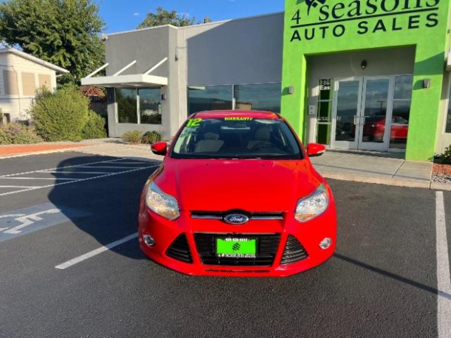 2012 Race Red /Charcoal Black Cloth/Leather Interior Ford Focus SEL Sedan (1FAHP3H29CL) with an 2.0L L4 DOHC 16V engine, 6-Speed Automatic transmission, located at 1865 East Red Hills Pkwy, St. George, 84770, (435) 628-0023, 37.120850, -113.543640 - We specialize in helping ALL people get the best financing available. No matter your credit score, good, bad or none we can get you an amazing rate. Had a bankruptcy, divorce, or repossessions? We give you the green light to get your credit back on the road. Low down and affordable payments that fit - Photo#1