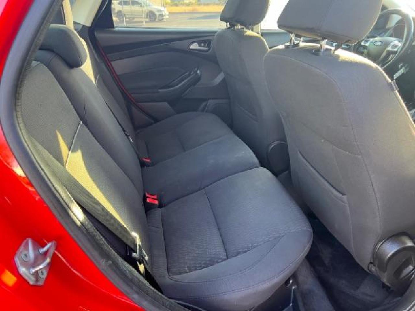 2012 Race Red /Charcoal Black Cloth/Leather Interior Ford Focus SEL Sedan (1FAHP3H29CL) with an 2.0L L4 DOHC 16V engine, 6-Speed Automatic transmission, located at 1865 East Red Hills Pkwy, St. George, 84770, (435) 628-0023, 37.120850, -113.543640 - We specialize in helping ALL people get the best financing available. No matter your credit score, good, bad or none we can get you an amazing rate. Had a bankruptcy, divorce, or repossessions? We give you the green light to get your credit back on the road. Low down and affordable payments that fit - Photo#27