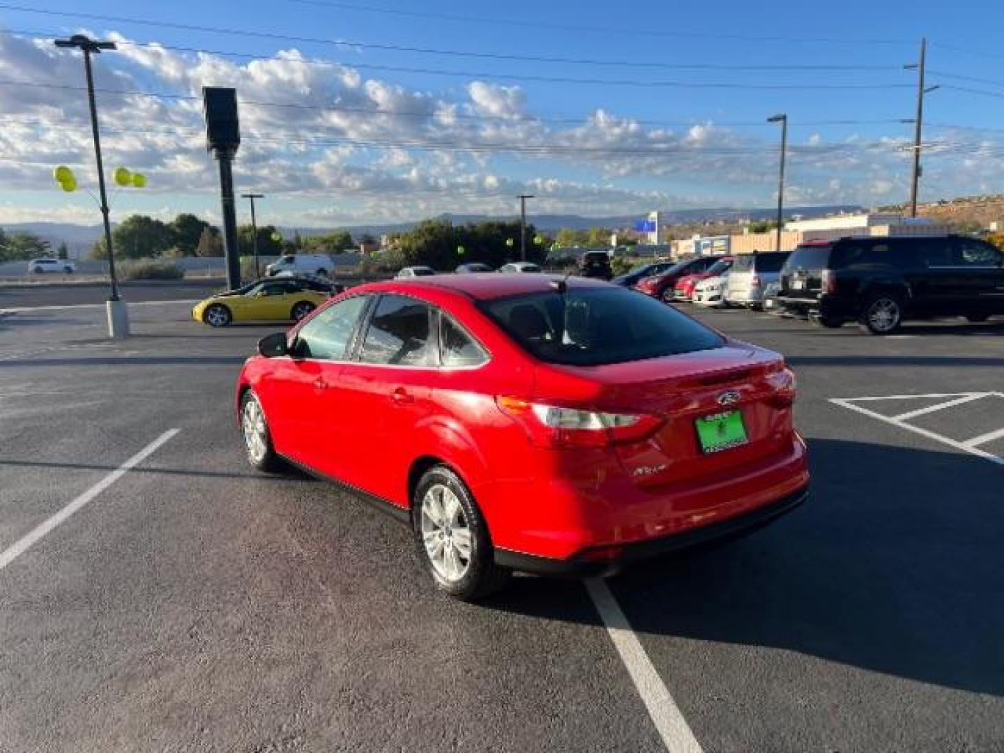 2012 Race Red /Charcoal Black Cloth/Leather Interior Ford Focus SEL Sedan (1FAHP3H29CL) with an 2.0L L4 DOHC 16V engine, 6-Speed Automatic transmission, located at 1865 East Red Hills Pkwy, St. George, 84770, (435) 628-0023, 37.120850, -113.543640 - We specialize in helping ALL people get the best financing available. No matter your credit score, good, bad or none we can get you an amazing rate. Had a bankruptcy, divorce, or repossessions? We give you the green light to get your credit back on the road. Low down and affordable payments that fit - Photo#4