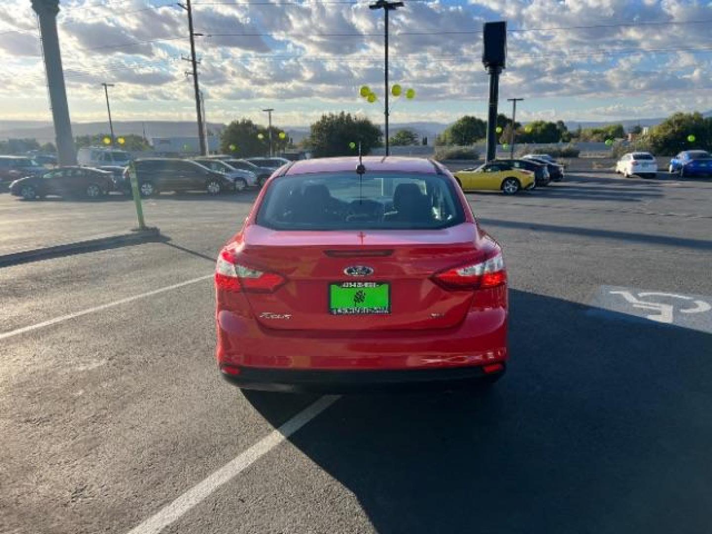 2012 Race Red /Charcoal Black Cloth/Leather Interior Ford Focus SEL Sedan (1FAHP3H29CL) with an 2.0L L4 DOHC 16V engine, 6-Speed Automatic transmission, located at 1865 East Red Hills Pkwy, St. George, 84770, (435) 628-0023, 37.120850, -113.543640 - We specialize in helping ALL people get the best financing available. No matter your credit score, good, bad or none we can get you an amazing rate. Had a bankruptcy, divorce, or repossessions? We give you the green light to get your credit back on the road. Low down and affordable payments that fit - Photo#5