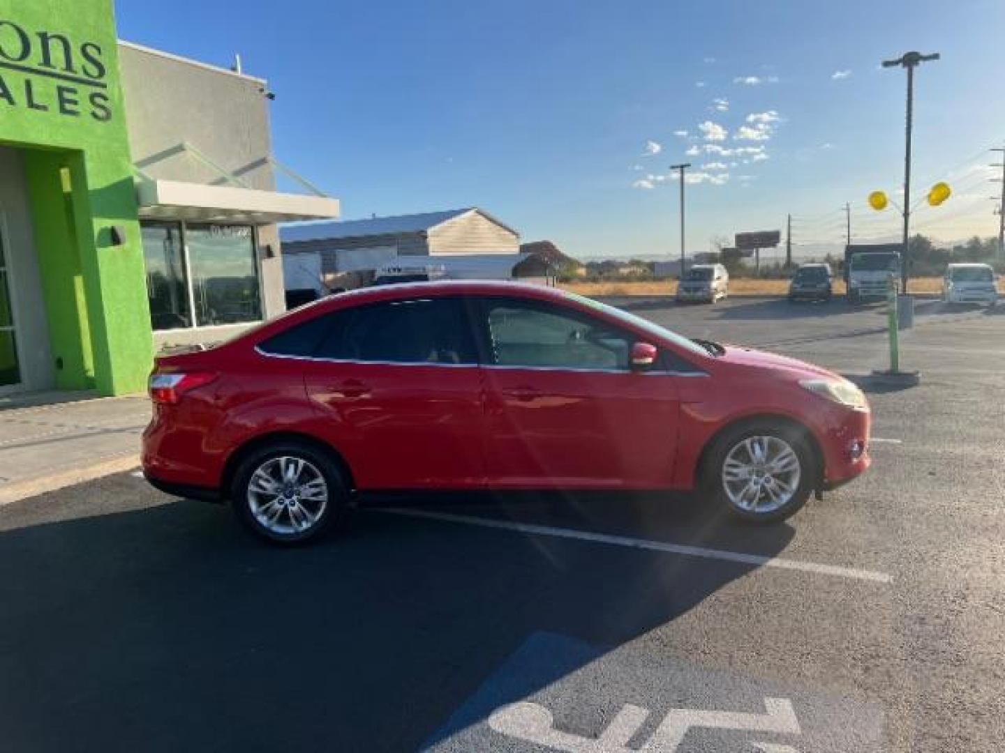 2012 Race Red /Charcoal Black Cloth/Leather Interior Ford Focus SEL Sedan (1FAHP3H29CL) with an 2.0L L4 DOHC 16V engine, 6-Speed Automatic transmission, located at 1865 East Red Hills Pkwy, St. George, 84770, (435) 628-0023, 37.120850, -113.543640 - We specialize in helping ALL people get the best financing available. No matter your credit score, good, bad or none we can get you an amazing rate. Had a bankruptcy, divorce, or repossessions? We give you the green light to get your credit back on the road. Low down and affordable payments that fit - Photo#7