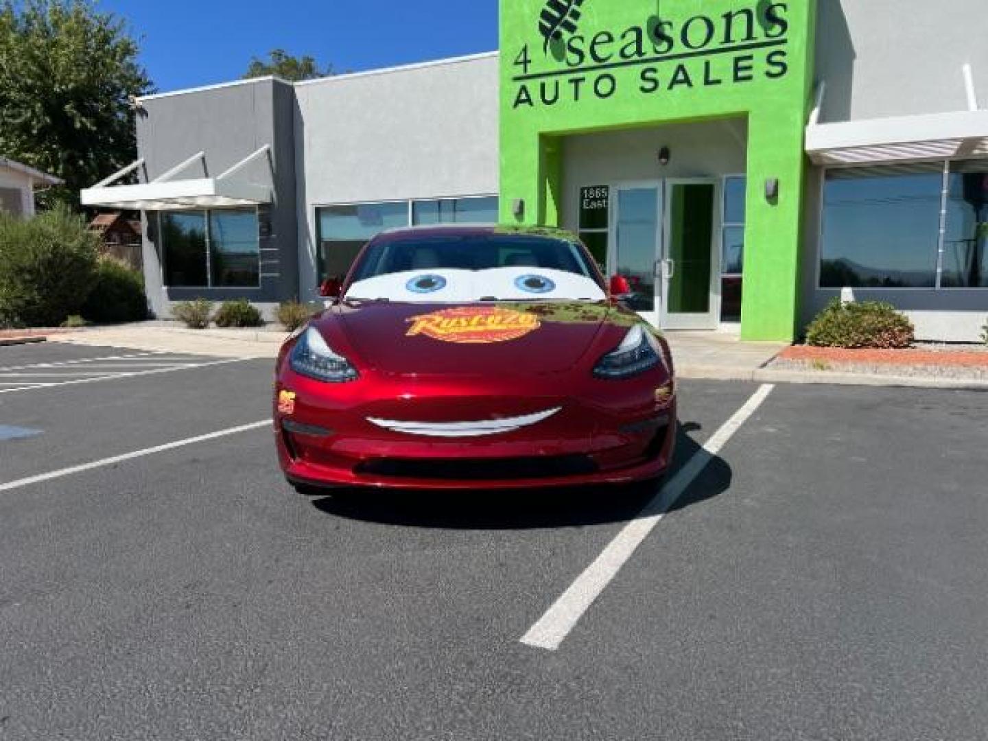 2018 Red /White Tesla Model 3 Long Range (5YJ3E1EB3JF) with an ELECTRIC engine, 1-Speed Automatic transmission, located at 1865 East Red Hills Pkwy, St. George, 84770, (435) 628-0023, 37.120850, -113.543640 - Your chance to own the most unique Tesla in town! Lightning McQueen is guaranteed to turn heads and make kids smile. A Long Range All Wheel Drive model 3 with aftermarket wheels ($1,000 Upgrade), spoiler and of course the coolest wrap in the state ($3,500 upgrade). WARRANTY on battery and motor un - Photo#2