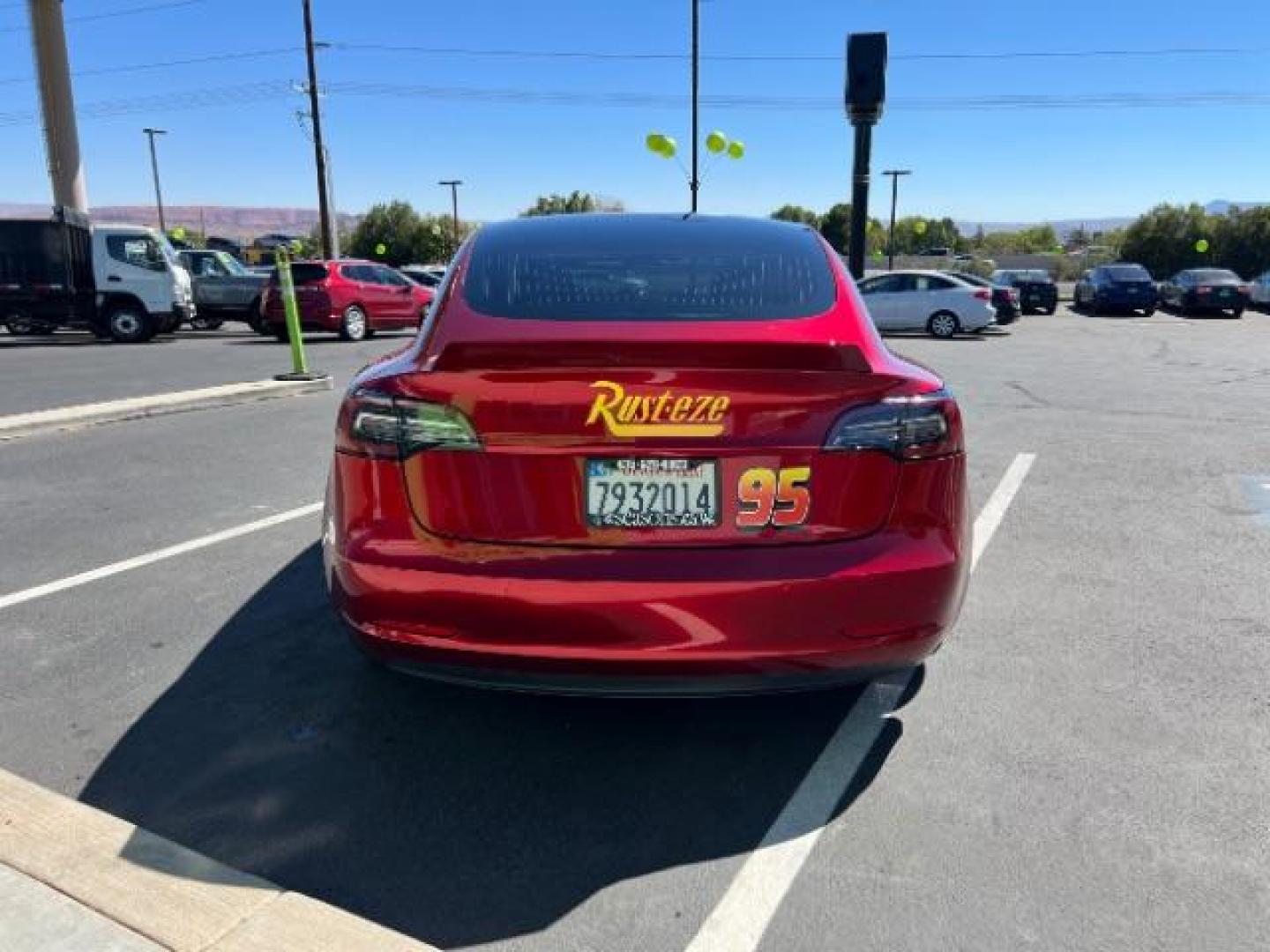 2018 Red /White Tesla Model 3 Long Range (5YJ3E1EB3JF) with an ELECTRIC engine, 1-Speed Automatic transmission, located at 1865 East Red Hills Pkwy, St. George, 84770, (435) 628-0023, 37.120850, -113.543640 - Your chance to own the most unique Tesla in town! Lightning McQueen is guaranteed to turn heads and make kids smile. A Long Range All Wheel Drive model 3 with aftermarket wheels ($1,000 Upgrade), spoiler and of course the coolest wrap in the state ($3,500 upgrade). WARRANTY on battery and motor un - Photo#6