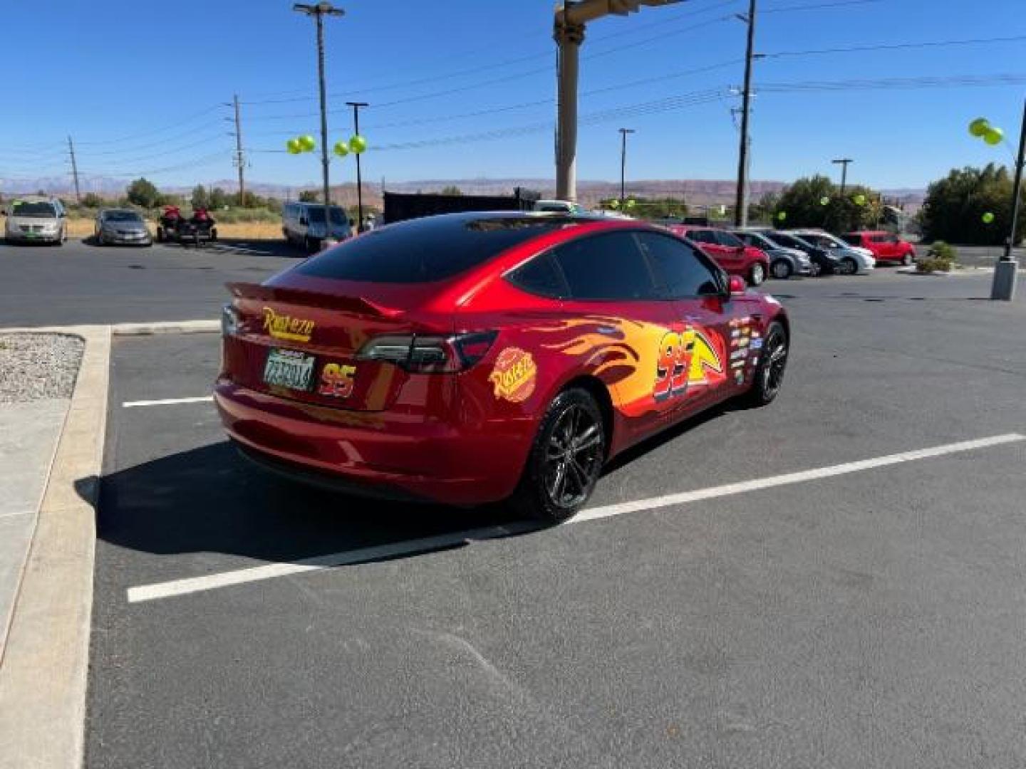 2018 Red /White Tesla Model 3 Long Range (5YJ3E1EB3JF) with an ELECTRIC engine, 1-Speed Automatic transmission, located at 1865 East Red Hills Pkwy, St. George, 84770, (435) 628-0023, 37.120850, -113.543640 - Your chance to own the most unique Tesla in town! Lightning McQueen is guaranteed to turn heads and make kids smile. A Long Range All Wheel Drive model 3 with aftermarket wheels ($1,000 Upgrade), spoiler and of course the coolest wrap in the state ($3,500 upgrade). WARRANTY on battery and motor un - Photo#7