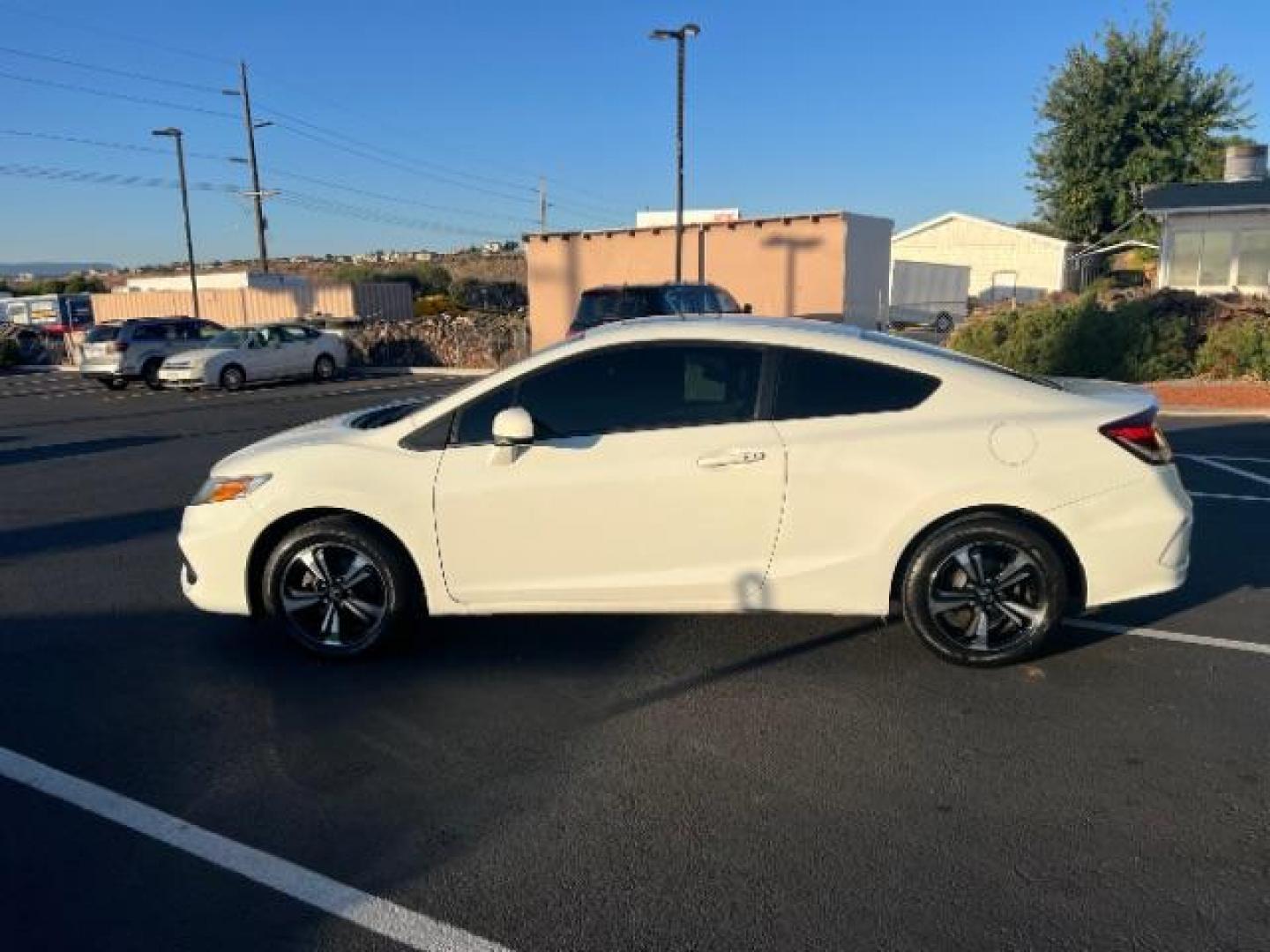 2015 Taffeta White /Black, cloth Honda Civic EX Coupe CVT (2HGFG3B85FH) with an 1.8L L4 SOHC 16V engine, Continuously Variable Transmission transmission, located at 1865 East Red Hills Pkwy, St. George, 84770, (435) 628-0023, 37.120850, -113.543640 - We specialize in helping ALL people get the best financing available. No matter your credit score, good, bad or none we can get you an amazing rate. Had a bankruptcy, divorce, or repossessions? We give you the green light to get your credit back on the road. Low down and affordable payments that fit - Photo#3