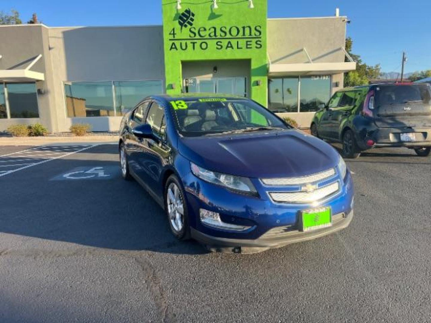 2013 Blue /Black Interior Chevrolet Volt Premium w/ Navigation and LEP (1G1RH6E4XDU) with an 1.4L L4 DOHC 16V PLUG-IN HYBRID engine, Continuously Variable Transmission transmission, located at 1865 East Red Hills Pkwy, St. George, 84770, (435) 628-0023, 37.120850, -113.543640 - ***This vehicle qualifies for the EV/Hybrid tax rebate of up to $4,000*** We are setup with the IRS to recieve direct payments within 72 hours. We file the rebate online with IRS and can credit it to your down payment, reduce the sales price OR give you cashback!! These cars will not last and can o - Photo#0