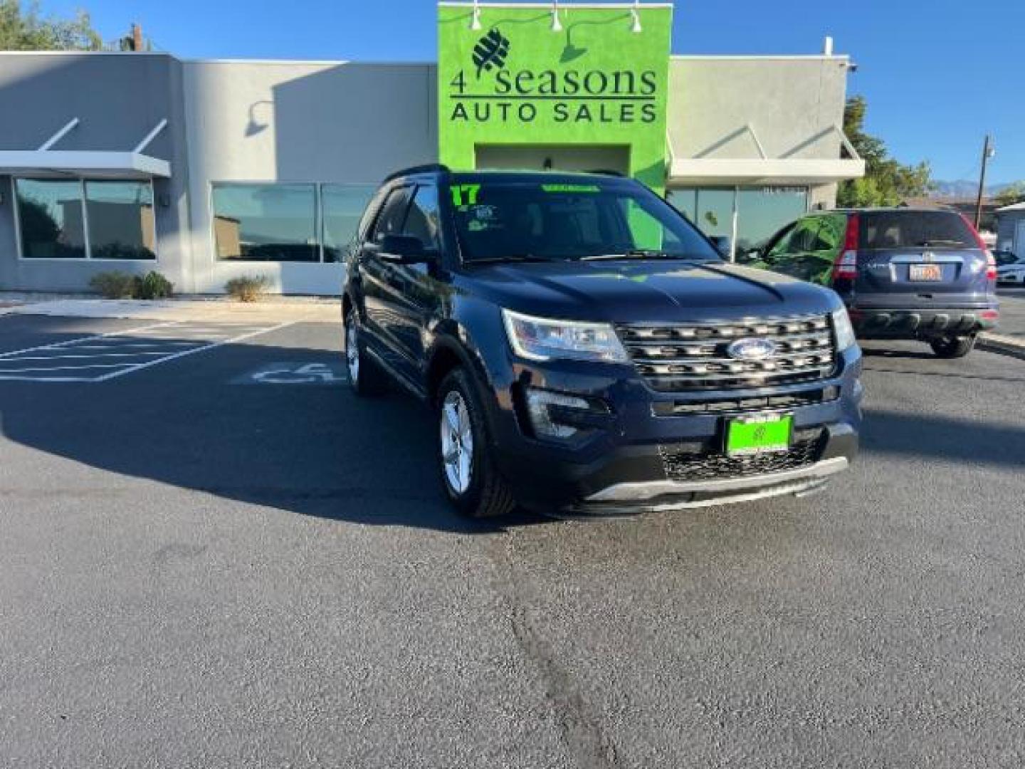 2017 Blue Jeans Metallic /Dark Earth w/Ebony Black, leather/sueded microfibe Ford Explorer XLT 4WD (1FM5K8D80HG) with an 3.5L V6 DOHC 24V engine, 6-Speed Automatic transmission, located at 940 North Main Street, Cedar City, UT, 84720, (435) 628-0023, 37.692936, -113.061897 - Photo#0