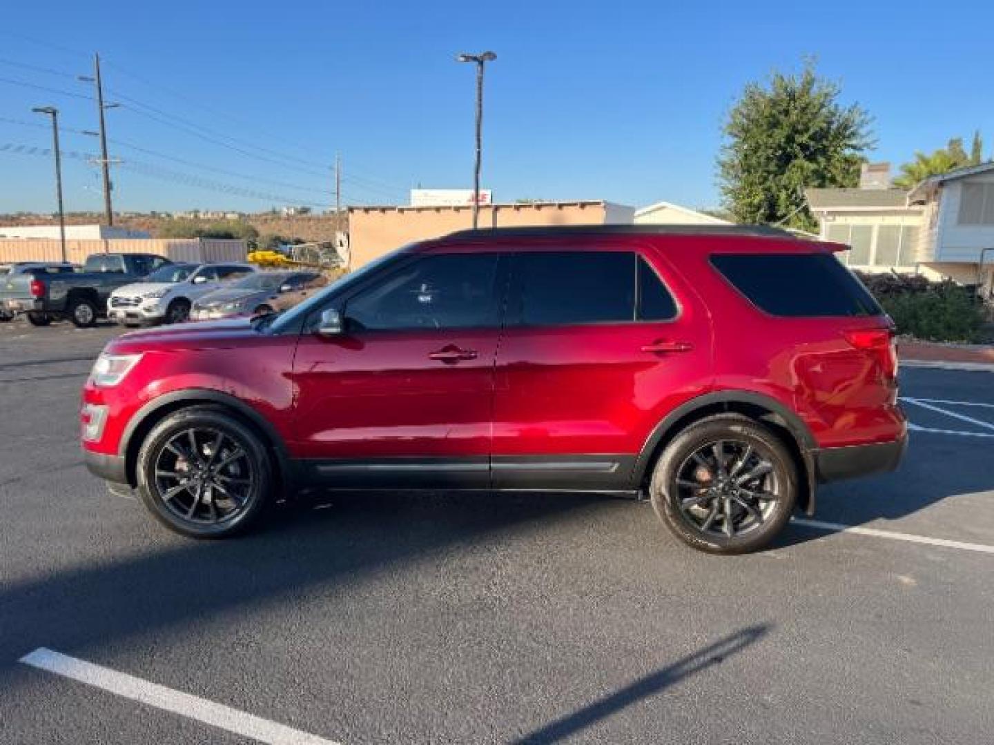 2017 Ruby Red Metallic Tinted Clearcoat /Dark Earth w/Ebony Black, leather/sueded microfibe Ford Explorer XLT FWD (1FM5K7D89HG) with an 3.5L V6 DOHC 24V engine, 6-Speed Automatic transmission, located at 940 North Main Street, Cedar City, UT, 84720, (435) 628-0023, 37.692936, -113.061897 - We specialize in helping ALL people get the best financing available. No matter your credit score, good, bad or none we can get you an amazing rate. Had a bankruptcy, divorce, or repossessions? We give you the green light to get your credit back on the road. Low down and affordable payments that fit - Photo#3