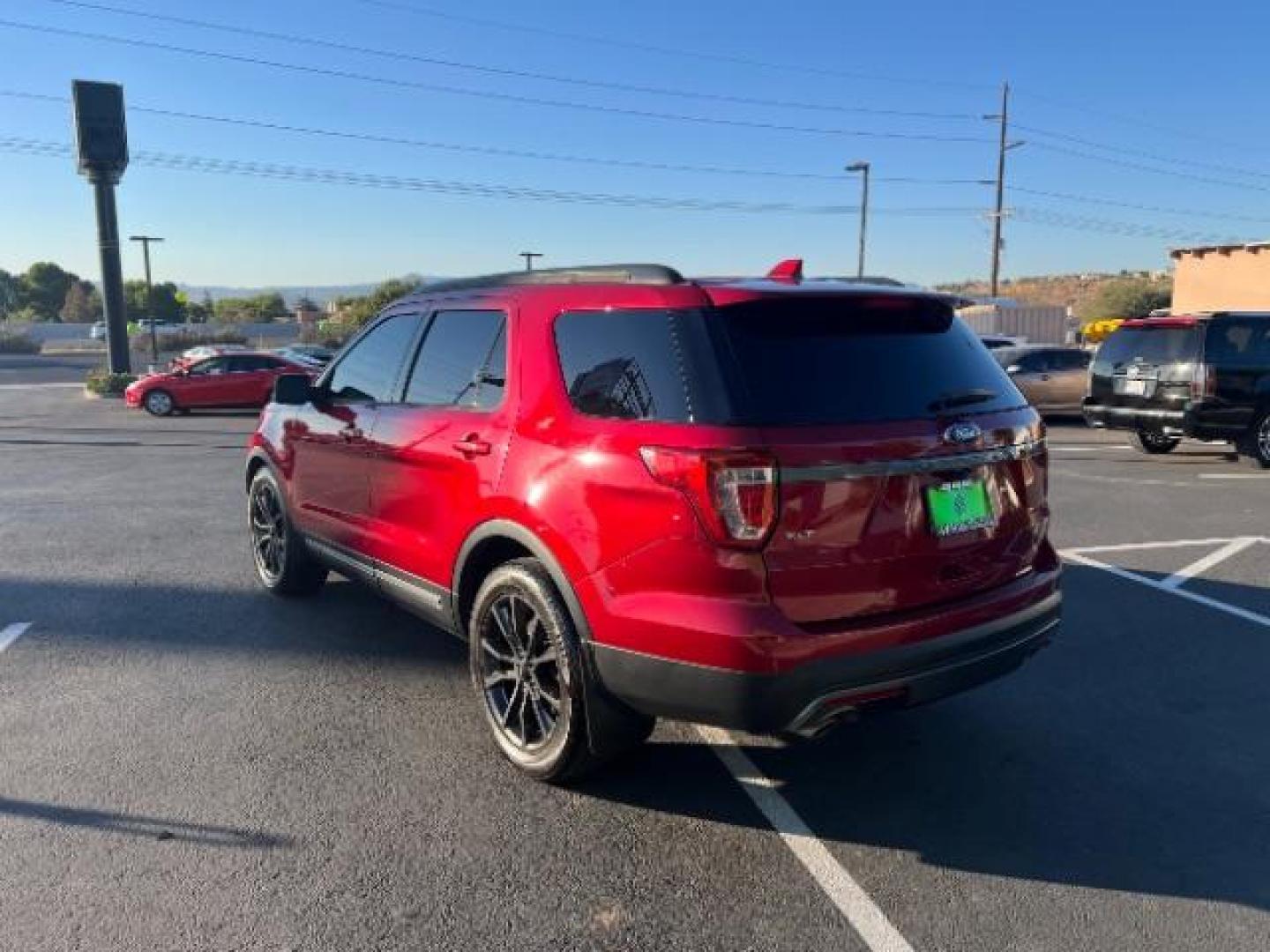 2017 Ruby Red Metallic Tinted Clearcoat /Dark Earth w/Ebony Black, leather/sueded microfibe Ford Explorer XLT FWD (1FM5K7D89HG) with an 3.5L V6 DOHC 24V engine, 6-Speed Automatic transmission, located at 940 North Main Street, Cedar City, UT, 84720, (435) 628-0023, 37.692936, -113.061897 - We specialize in helping ALL people get the best financing available. No matter your credit score, good, bad or none we can get you an amazing rate. Had a bankruptcy, divorce, or repossessions? We give you the green light to get your credit back on the road. Low down and affordable payments that fit - Photo#4