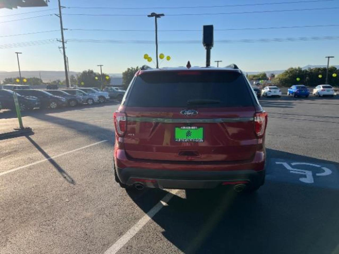 2017 Ruby Red Metallic Tinted Clearcoat /Dark Earth w/Ebony Black, leather/sueded microfibe Ford Explorer XLT FWD (1FM5K7D89HG) with an 3.5L V6 DOHC 24V engine, 6-Speed Automatic transmission, located at 940 North Main Street, Cedar City, UT, 84720, (435) 628-0023, 37.692936, -113.061897 - We specialize in helping ALL people get the best financing available. No matter your credit score, good, bad or none we can get you an amazing rate. Had a bankruptcy, divorce, or repossessions? We give you the green light to get your credit back on the road. Low down and affordable payments that fit - Photo#5