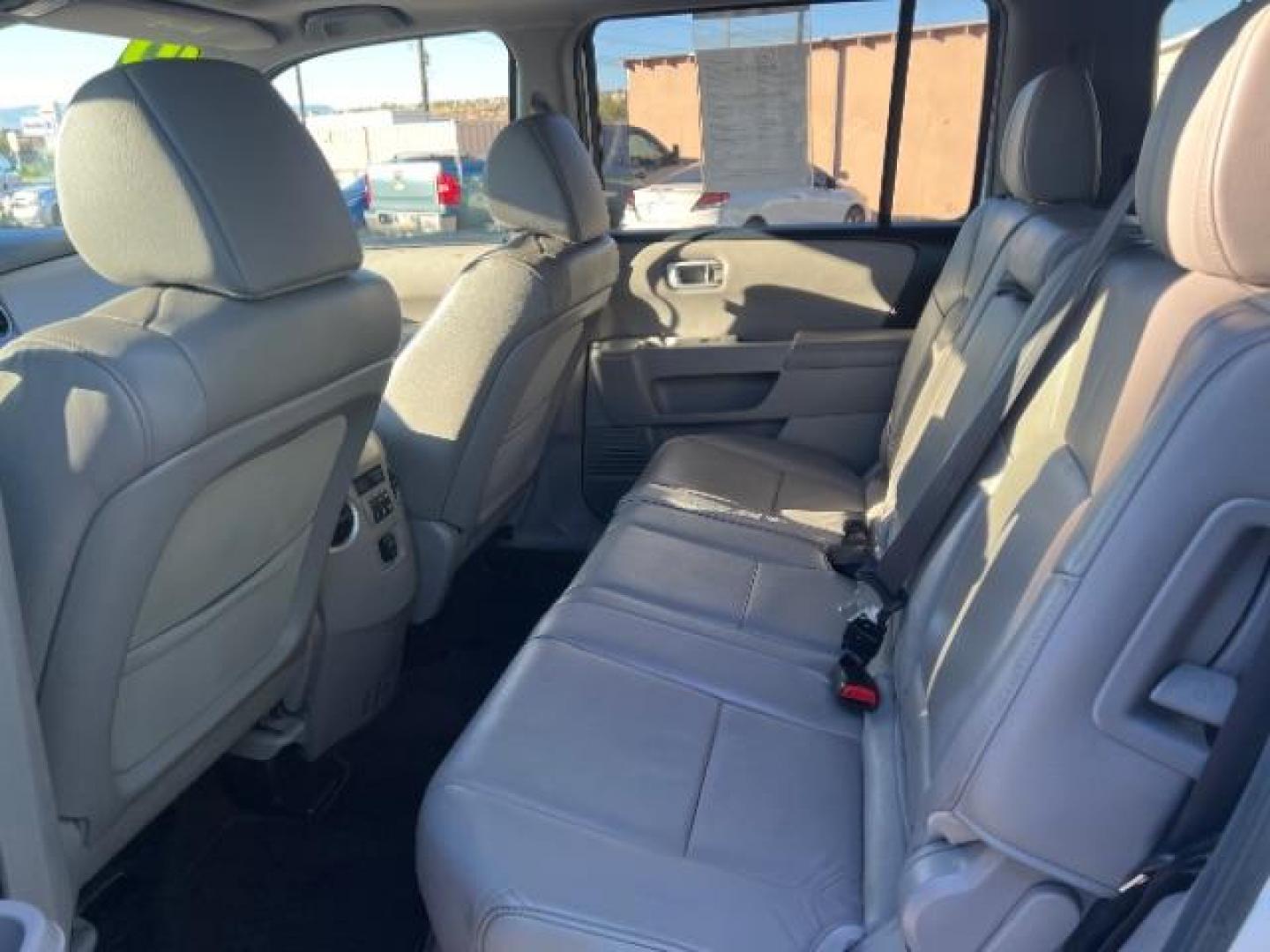 2013 Taffeta White /Beige Leather Interior Honda Pilot EX-L 4WD 5-Spd AT (5FNYF4H50DB) with an 3.5L V6 SOHC 24V engine, 5-Speed Automatic transmission, located at 1865 East Red Hills Pkwy, St. George, 84770, (435) 628-0023, 37.120850, -113.543640 - We specialize in helping ALL people get the best financing available. No matter your credit score, good, bad or none we can get you an amazing rate. Had a bankruptcy, divorce, or repossessions? We give you the green light to get your credit back on the road. Low down and affordable payments that fit - Photo#20