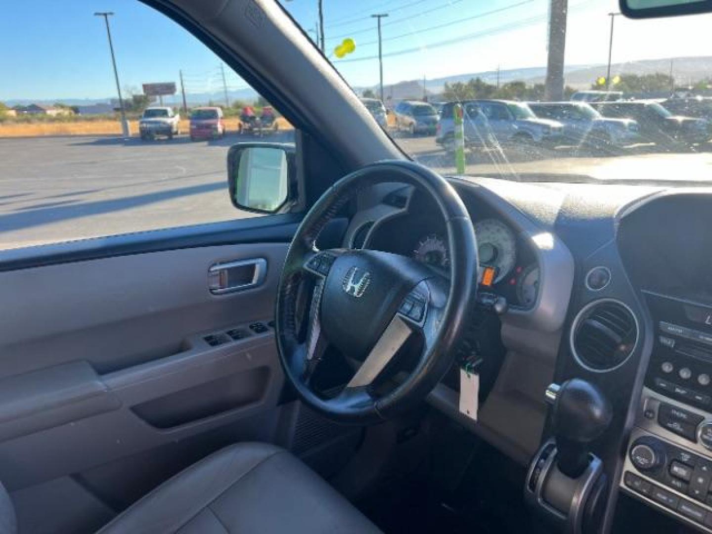 2013 Taffeta White /Beige Leather Interior Honda Pilot EX-L 4WD 5-Spd AT (5FNYF4H50DB) with an 3.5L V6 SOHC 24V engine, 5-Speed Automatic transmission, located at 1865 East Red Hills Pkwy, St. George, 84770, (435) 628-0023, 37.120850, -113.543640 - We specialize in helping ALL people get the best financing available. No matter your credit score, good, bad or none we can get you an amazing rate. Had a bankruptcy, divorce, or repossessions? We give you the green light to get your credit back on the road. Low down and affordable payments that fit - Photo#37