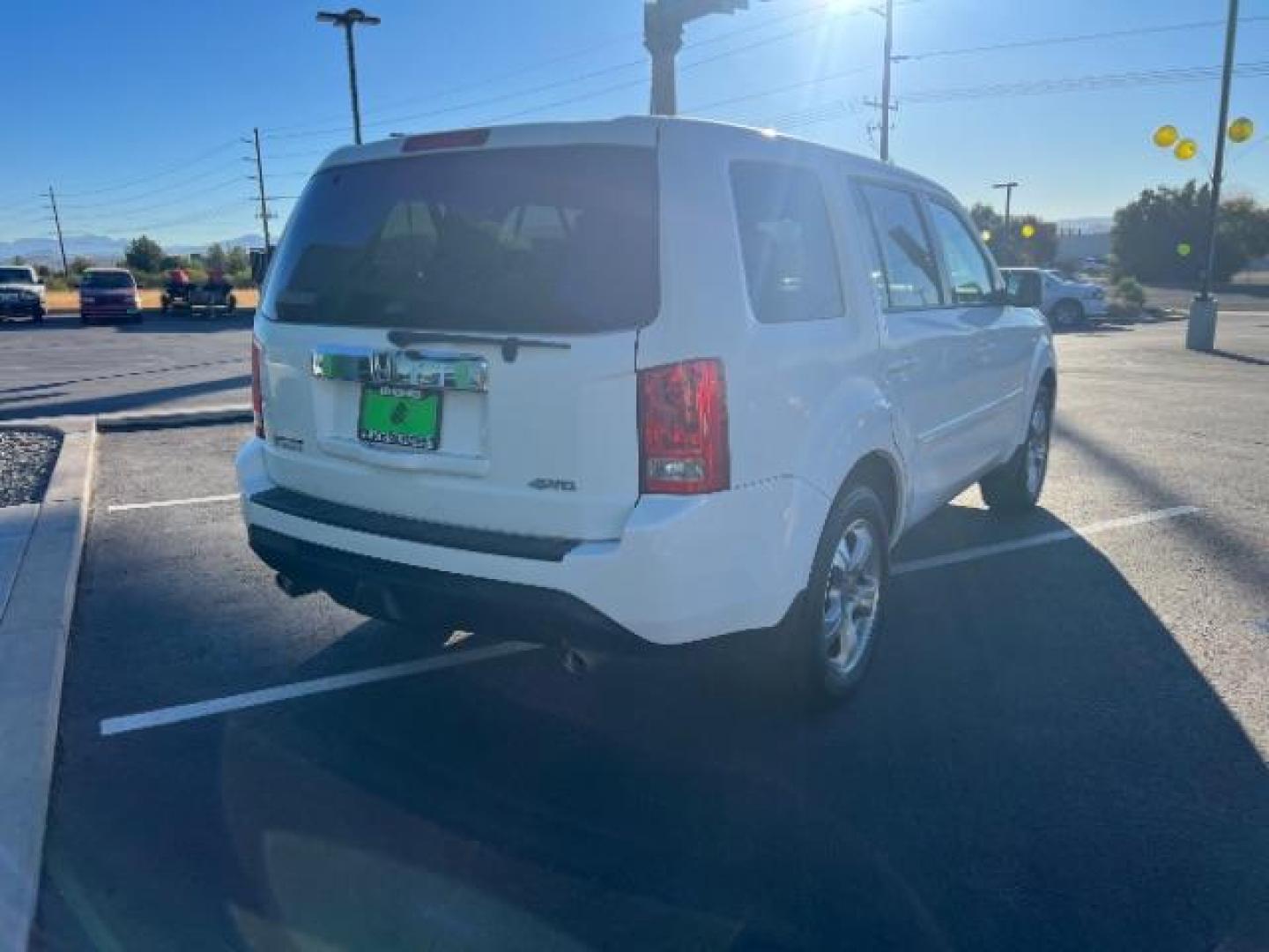 2013 Taffeta White /Beige Leather Interior Honda Pilot EX-L 4WD 5-Spd AT (5FNYF4H50DB) with an 3.5L V6 SOHC 24V engine, 5-Speed Automatic transmission, located at 1865 East Red Hills Pkwy, St. George, 84770, (435) 628-0023, 37.120850, -113.543640 - We specialize in helping ALL people get the best financing available. No matter your credit score, good, bad or none we can get you an amazing rate. Had a bankruptcy, divorce, or repossessions? We give you the green light to get your credit back on the road. Low down and affordable payments that fit - Photo#6